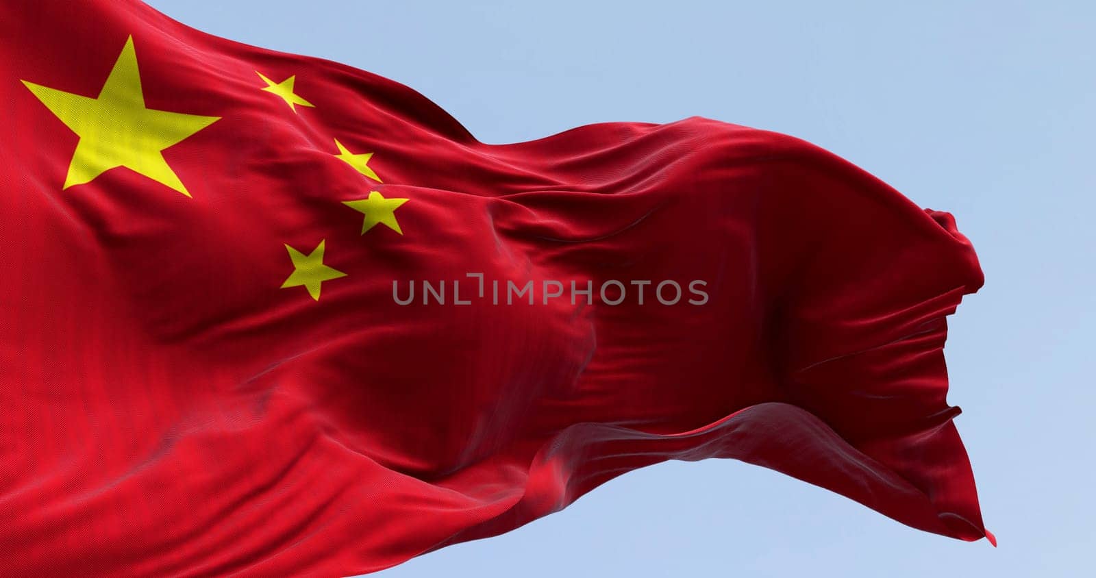 Close-up of national flag of China waving in the wind. Red background, five yellow stars. The largest symbolizes the guidance of the Chinese Communist Party. 3D illustration render. Rippled fabric