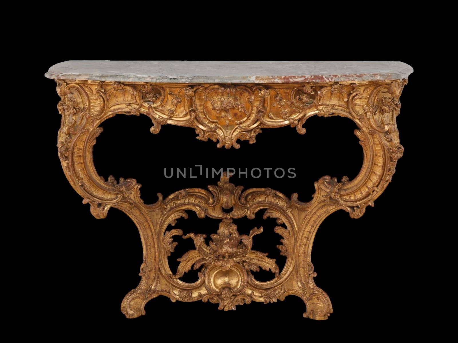 Elaborate gilded Rococo console table, German, circa 1755-60. Features ornate carvings, flowing lines, and a marble top. Evokes a sense of luxury and historical opulence.