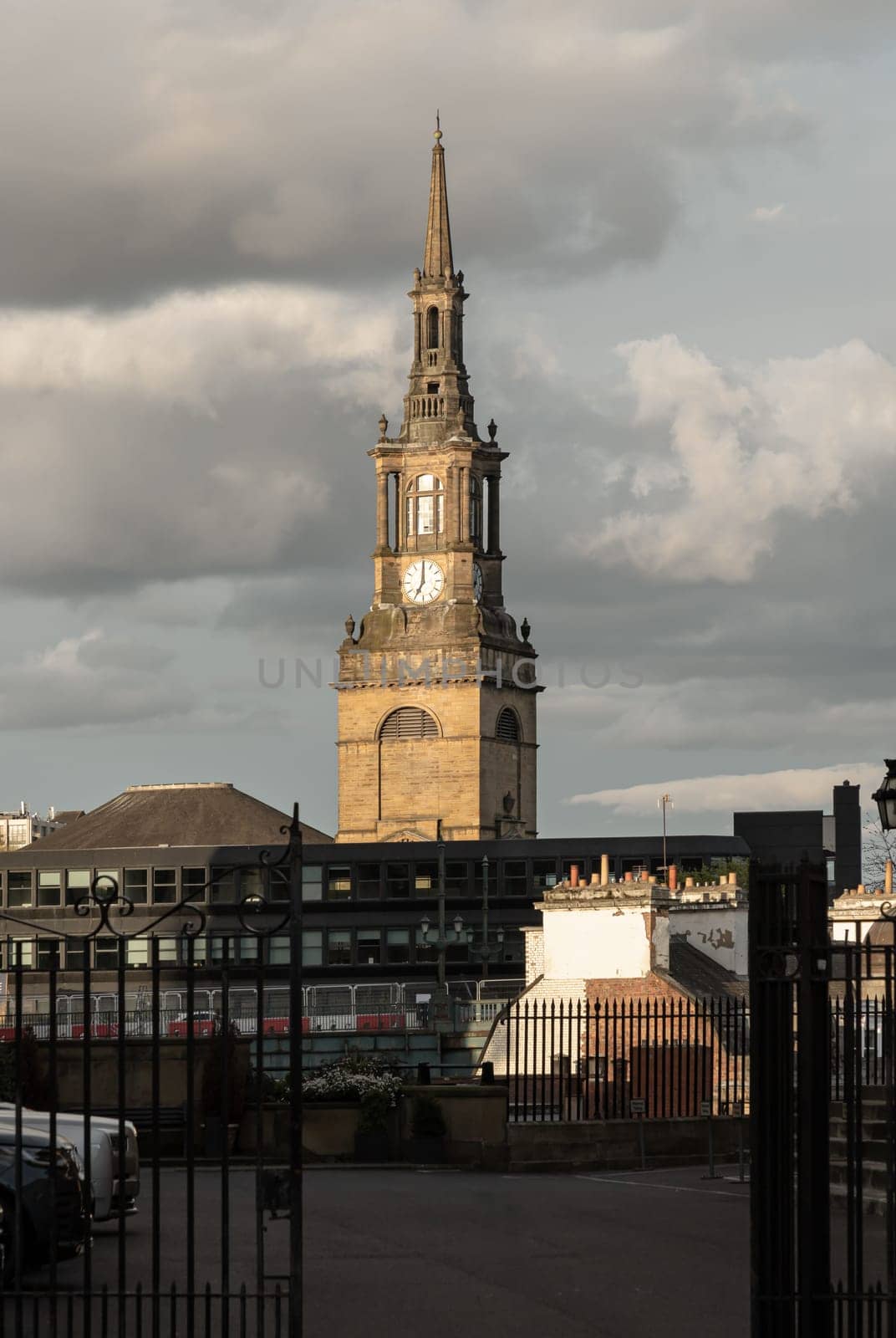 Newcastle, UK - Apr 11, 2025 - All Saints' Church or All Hallows was built in the Gothic style and is the elliptical church building with semi-octagonal tower at Lower Pilgrim Street, Newcastle upon Tyne, England, use it as your Wallpaper, Poster and Copy space, Selective focus.