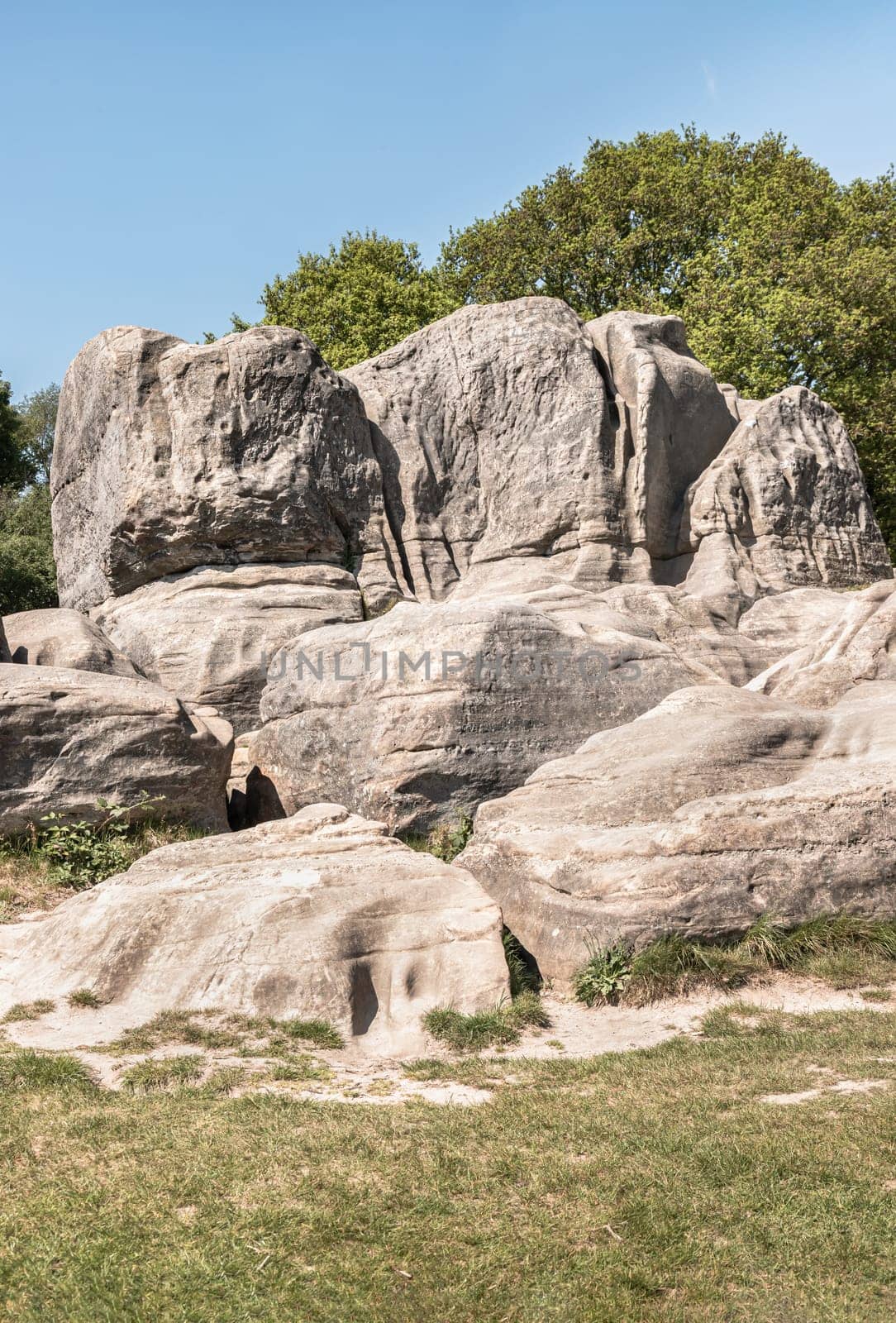 Scenery view of An unusual outcrop of natural sandstone rocks on Wellington Rocks at Tunbridge Wells Common. use it as your Wallpaper, Poster and Copy space, Selective focus.