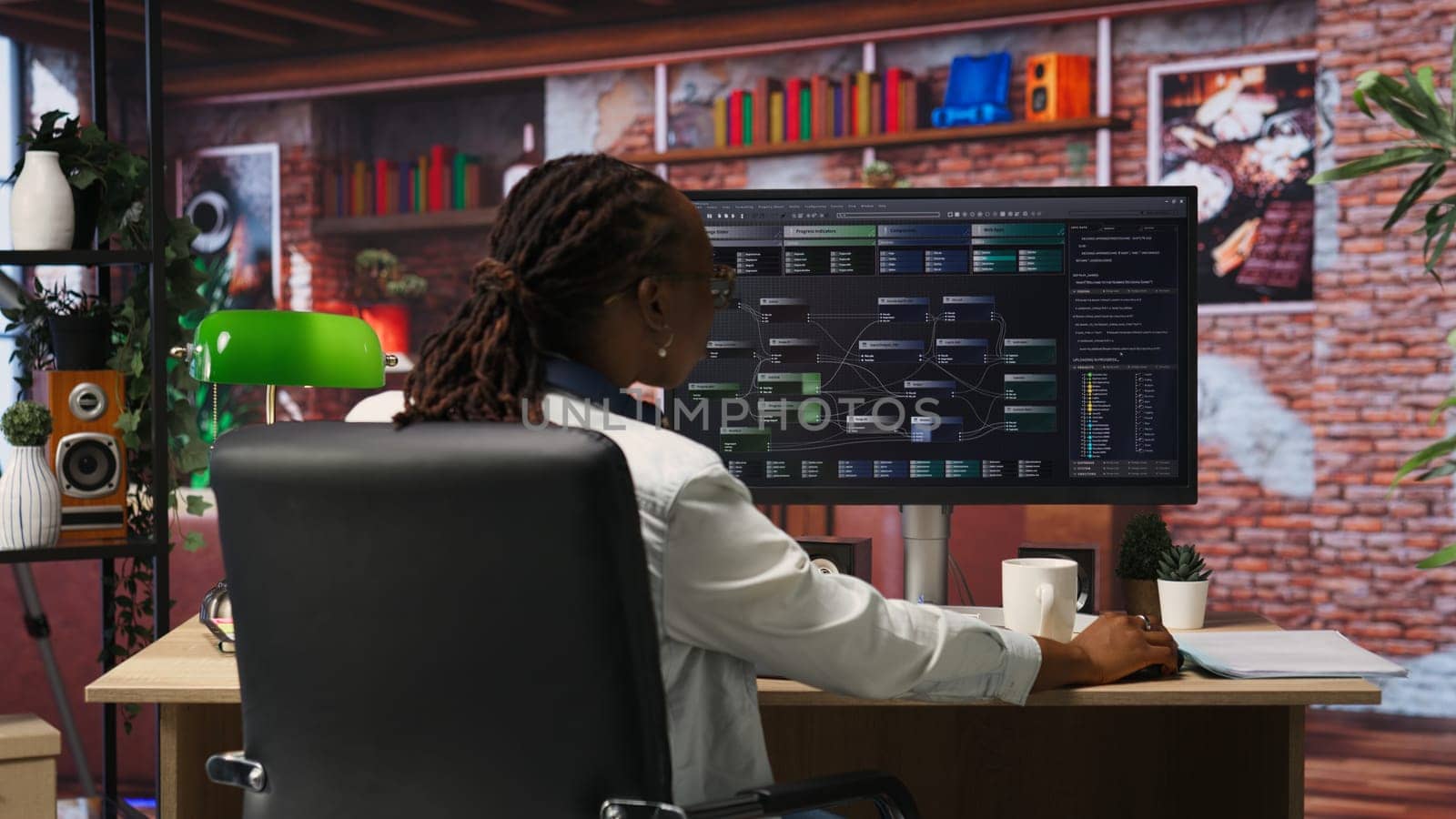 Teleworking programmer using computer for artificial intelligence computing through self learning algorithms. Remote worker working with AI deep neural networks on desktop PC, camera B
