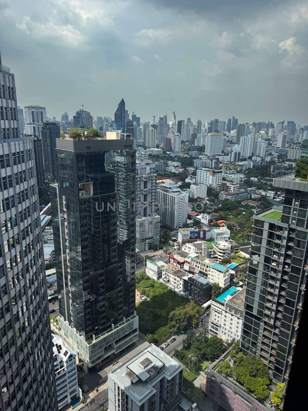 Skyscrapers in Bangkok with skyline views in middle of city center, downtown corporate area with breathtaking infrastructure for urban growth. Modern towers in the Thai metropolis.