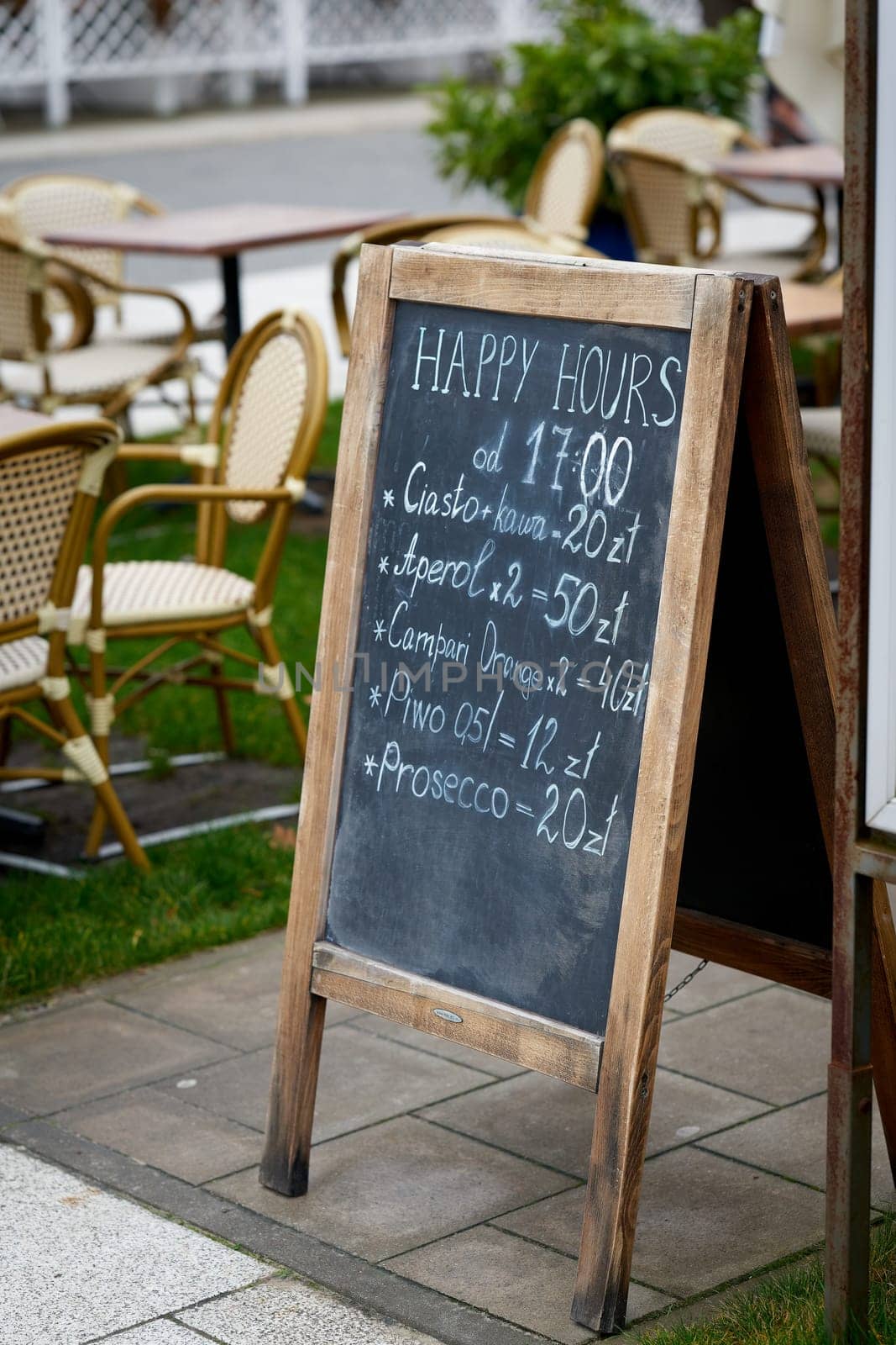 Display advertising a selection of soft drinks and alcohol at a bar in Swinoujscie, Poland