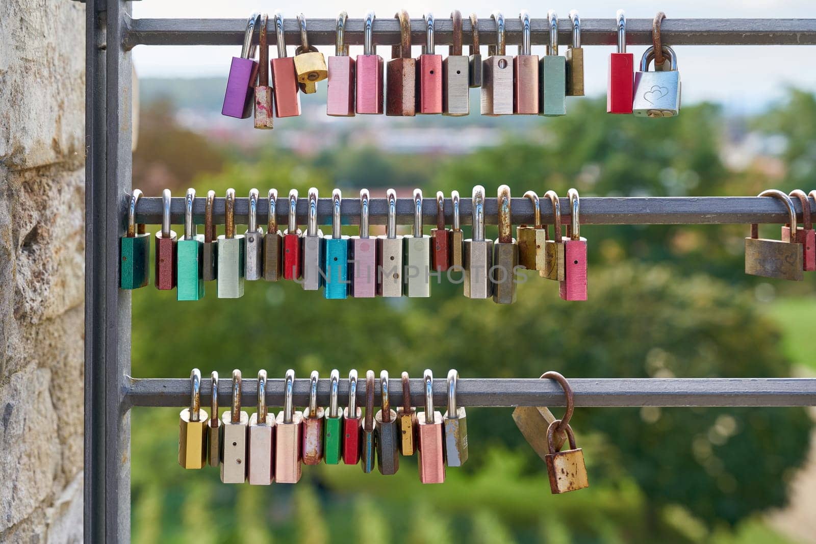 Love locks as a symbol of eternal love on a fence at the Petersberg Citadel in Erfurt