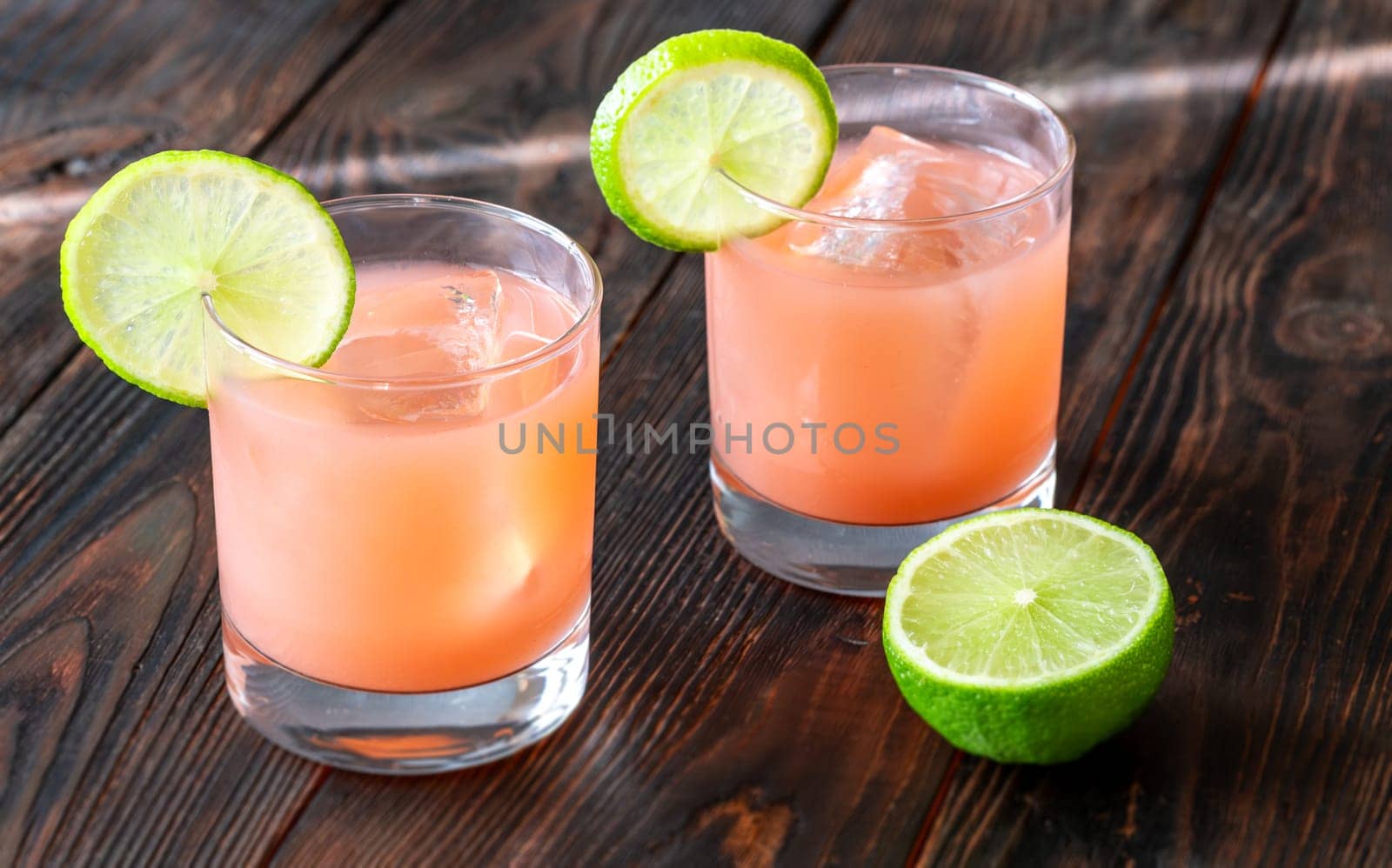 Guava, lime, and tequila blend in tropical harmony with citrus-laced elegance