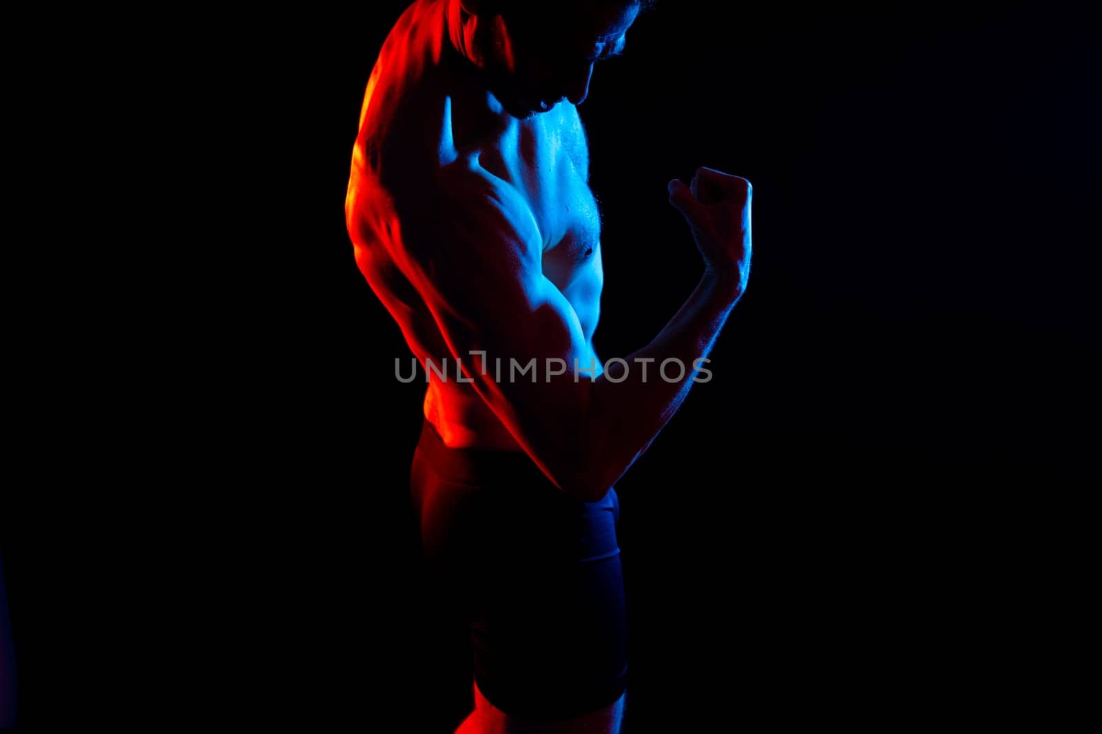 Portrait, happy man and bodybuilder with abs on a studio background, backdrop and topless pride