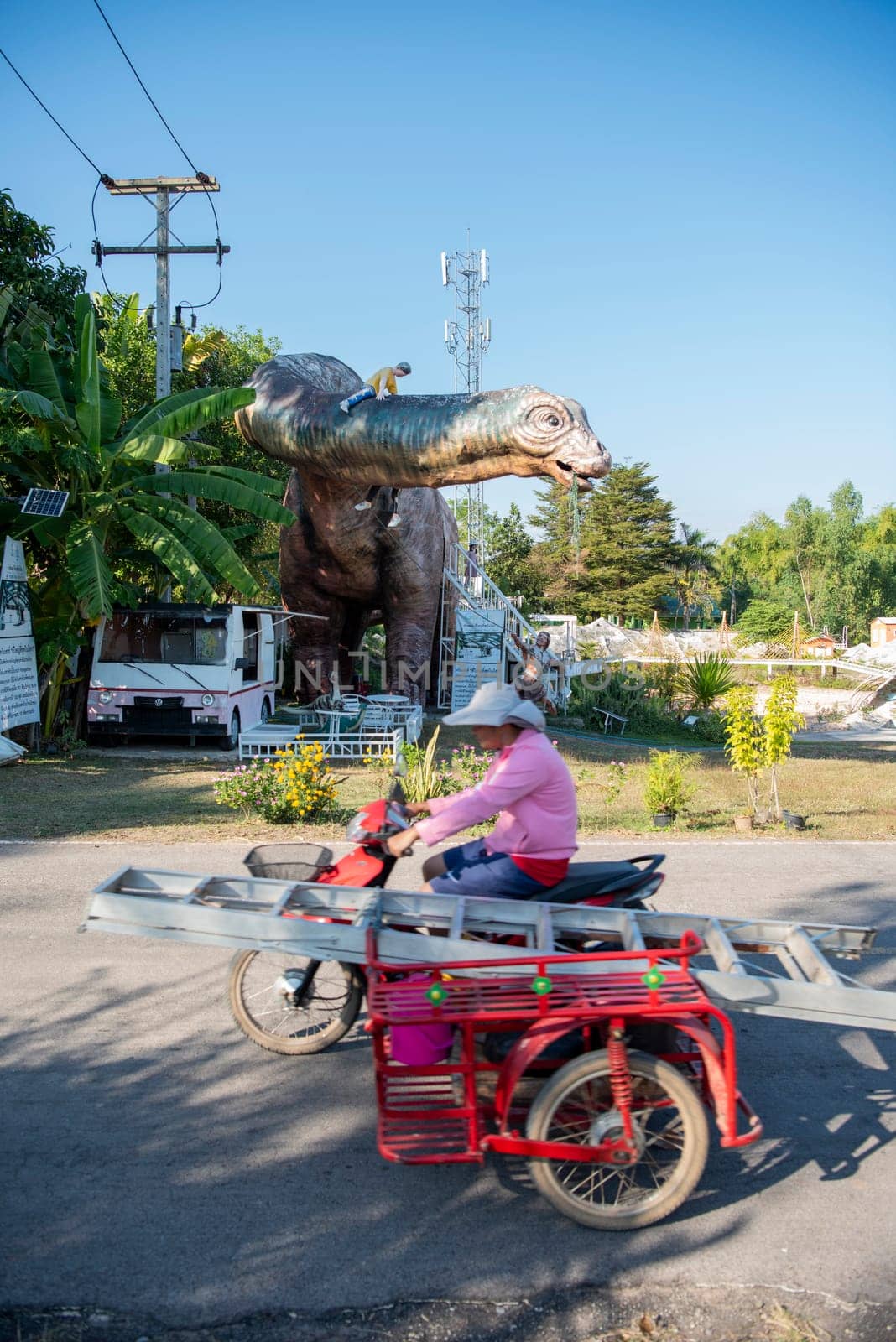 A Dinosaur Monument at a Village in Amphoe Phu Wiang in  Province of Khon Kaen in Thailand. Thailand, Khon Kaen, December, 6, 2024