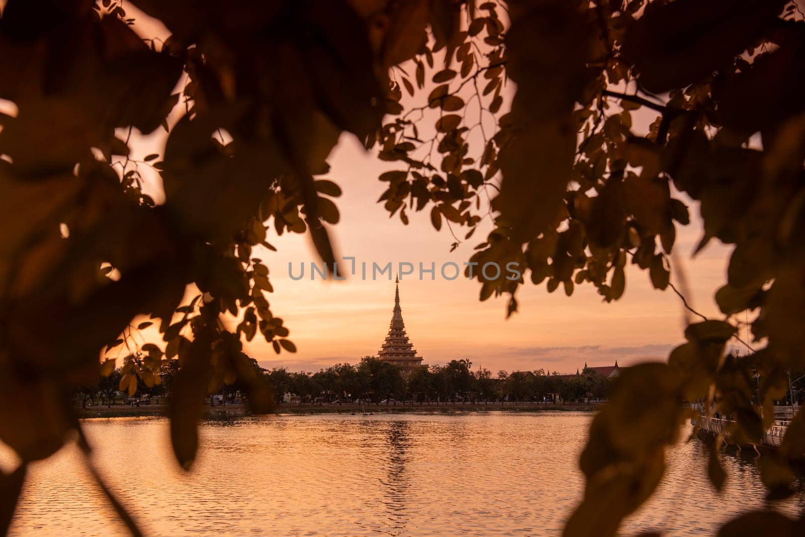 Phra Mahathat Kaen Nakhon at  Buen Kaen Nakhon Lake  in City and Province Khon Kaen in Thailand. Thailand, Khon Kaen, December, 7, 2024