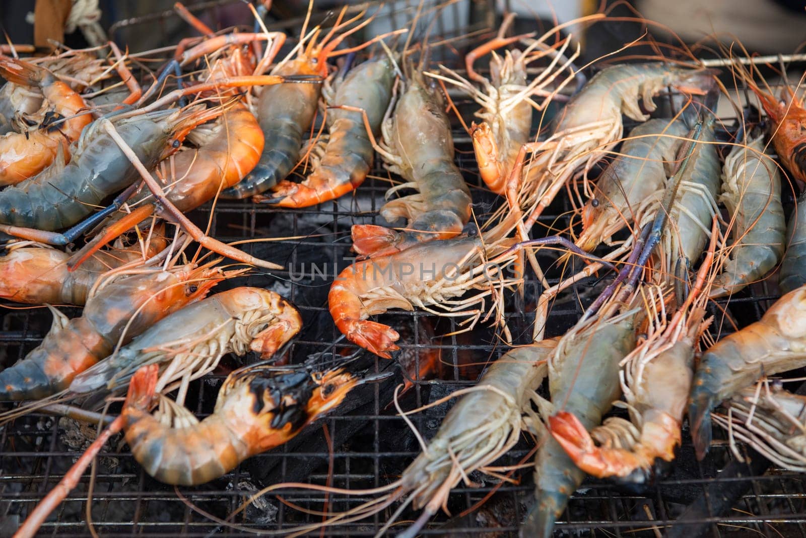 Grill Prawns at Thai Food Market on Wat Saket Festival Fair in Bangkok in Thailand.  Thailand, Bangkok, November, 8, 2024.