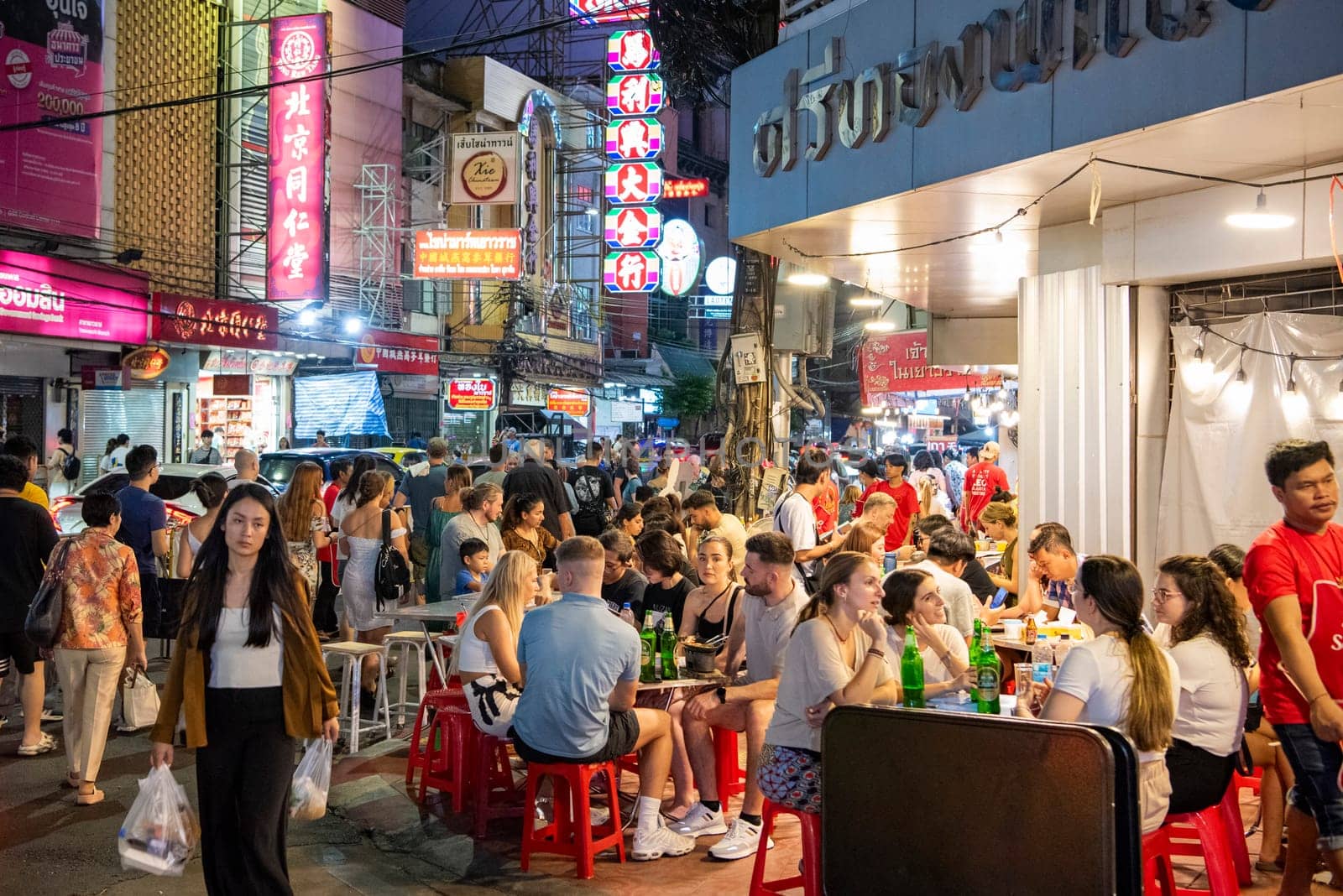 People at Night Streetmarket on Yaowarat Road in Chinatown in City of Bangkok in Thailand.  Thailand, Bangkok, November, 4, 2024.