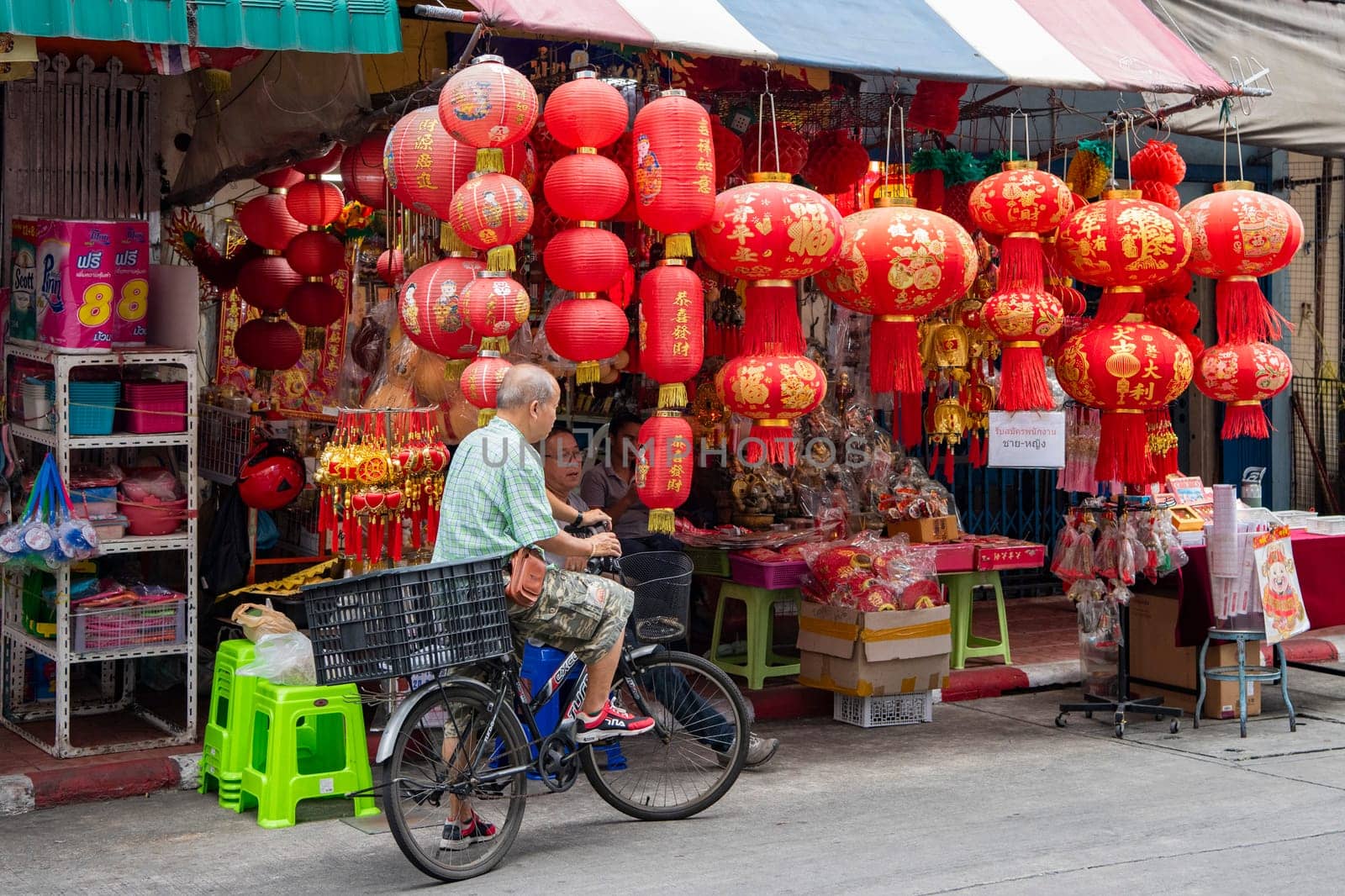 a street with shops and Market the China Town with skyline in the City of Bangkok in Thailand.  Thailand, Bangkok, November, 5, 2024.