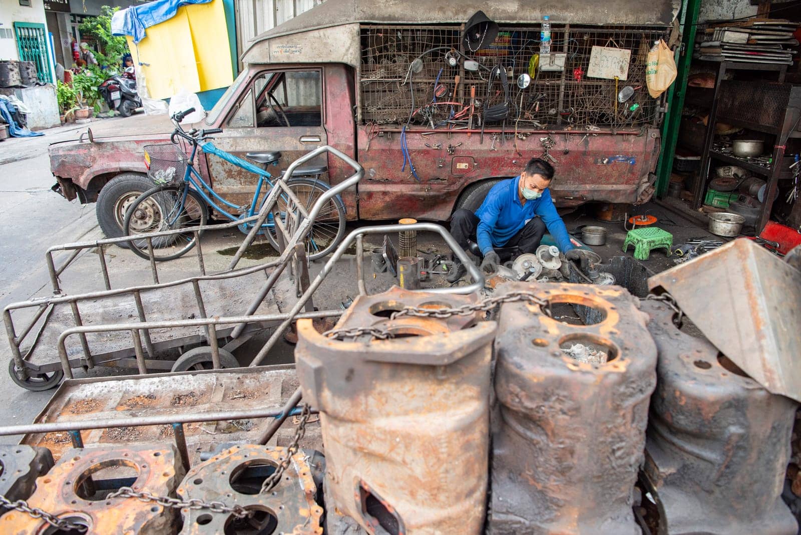 a Metal worker at his shop in Talat Noi at China Town in City of Bangkok in Thailand.  Thailand, Bangkok, November, 5, 2024.
