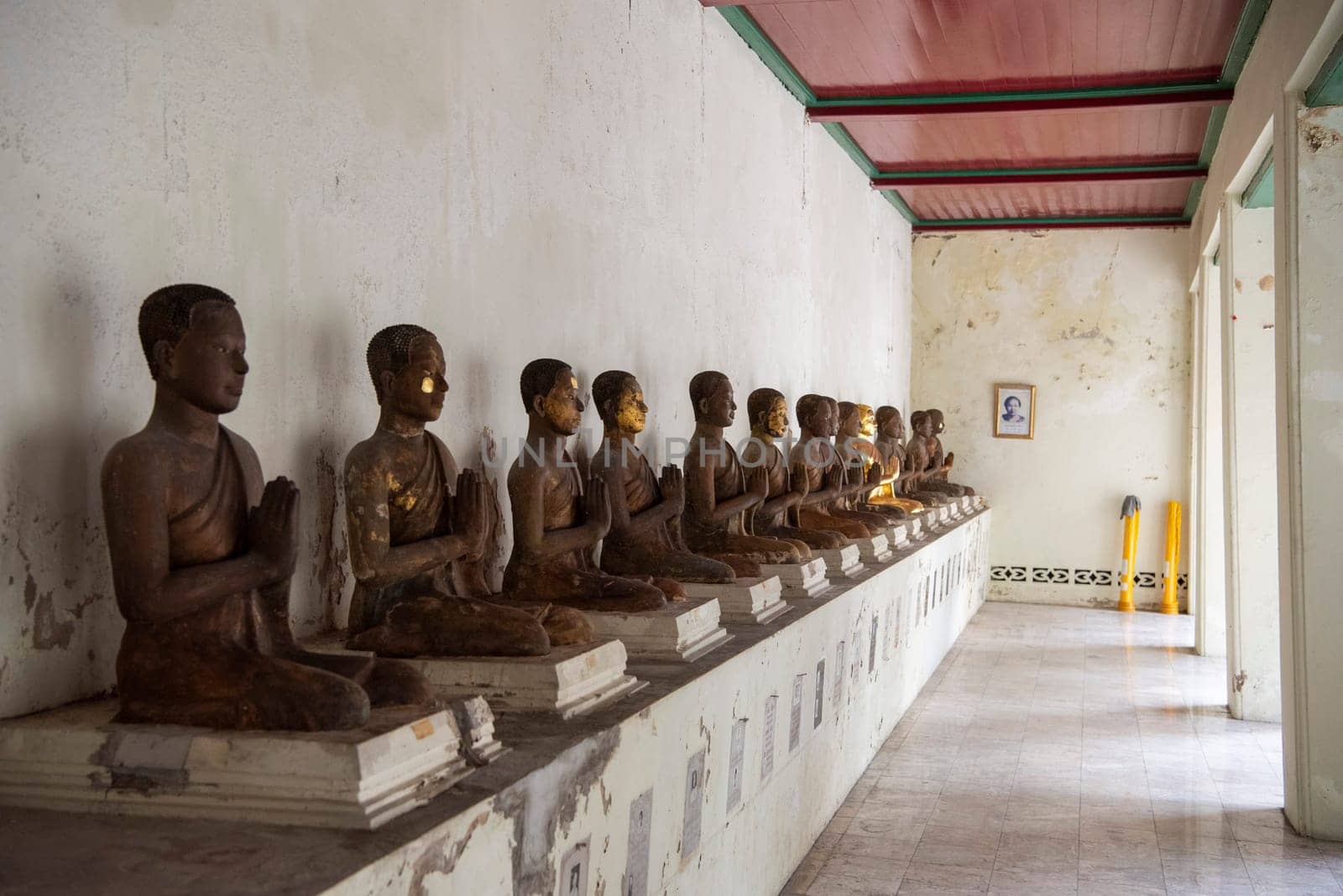 Buddha Gallery at Wat Kan Matuyaram in China Town in City of Bangkok in Thailand.  Thailand, Bangkok, November, 5, 2024.