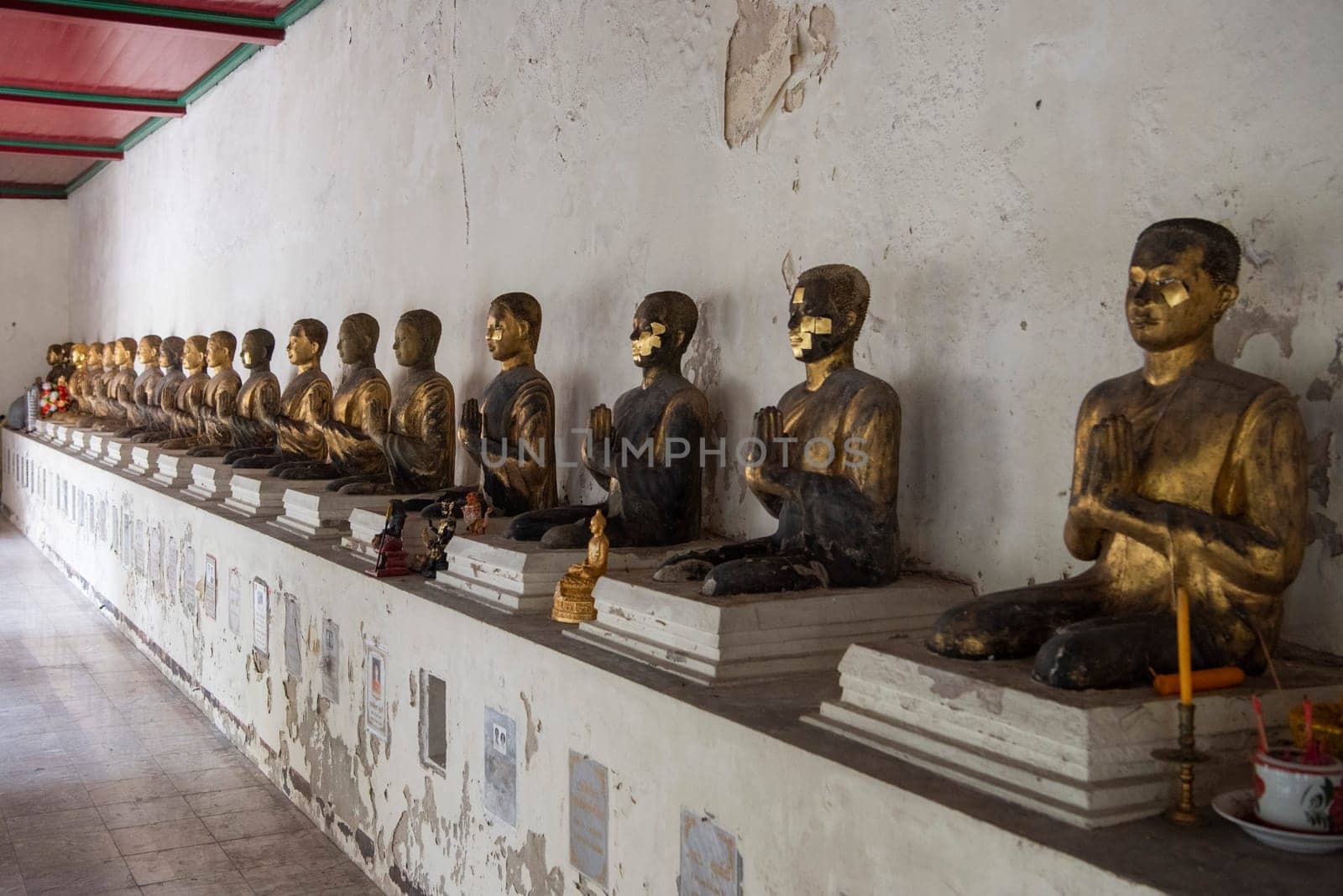 Buddha Gallery at Wat Kan Matuyaram in China Town in City of Bangkok in Thailand.  Thailand, Bangkok, November, 5, 2024.