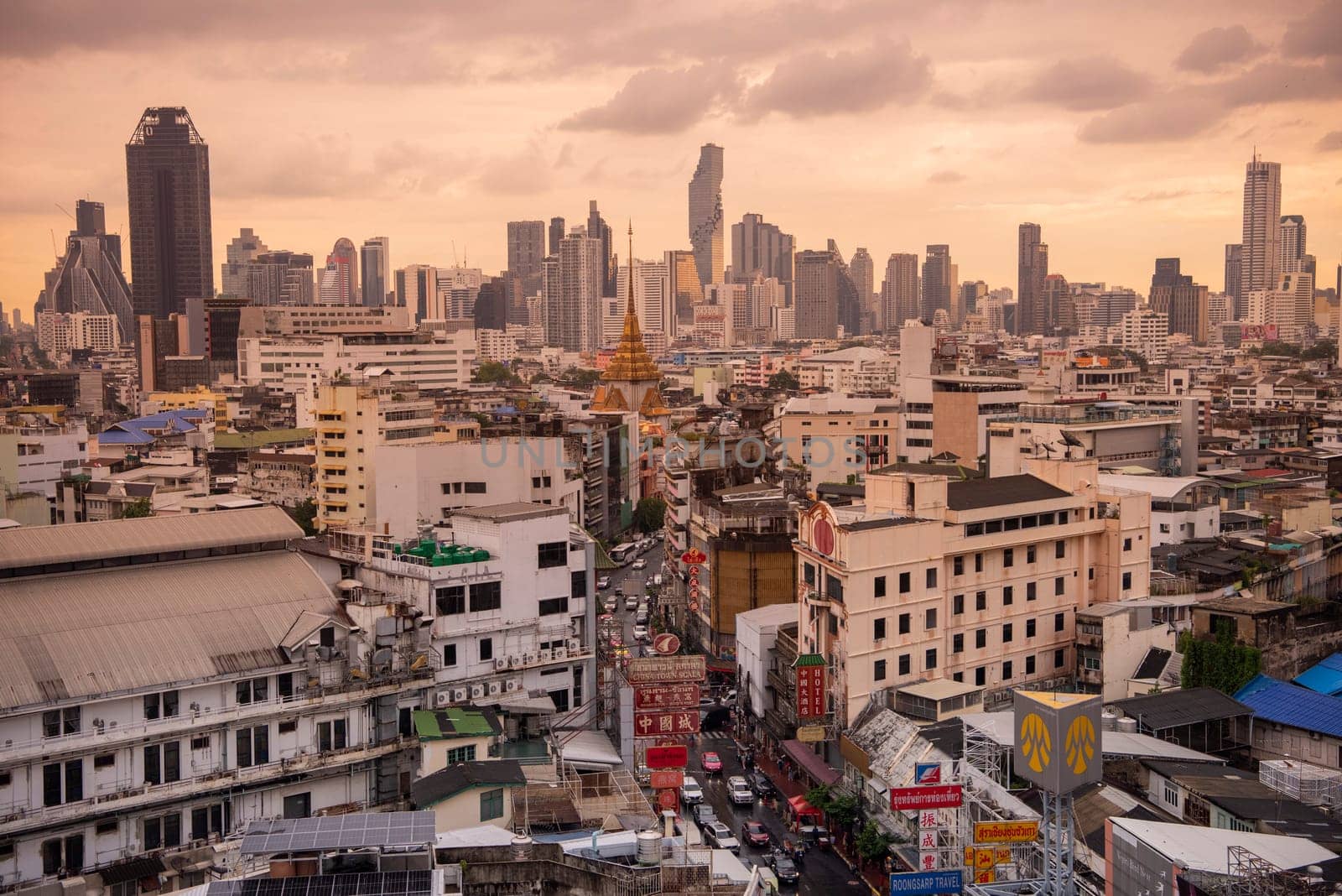 a view on Yaowarat Road in China Town with skyline in City of Bangkok in Thailand.  Thailand, Bangkok, November, 5, 2024.