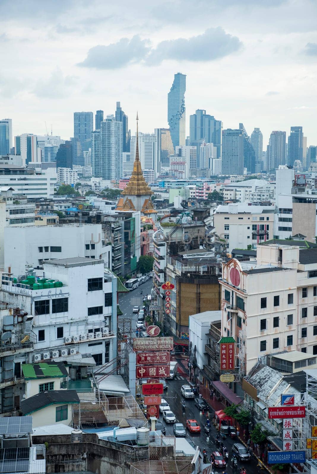 a view on Yaowarat Road in China Town with skyline in City of Bangkok in Thailand.  Thailand, Bangkok, November, 5, 2024.