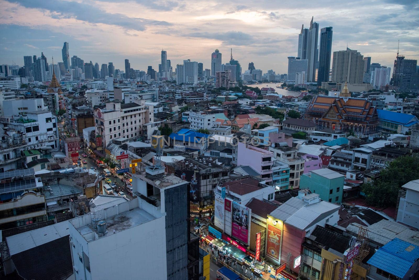 a view on Yaowarat Road in China Town with skyline in City of Bangkok in Thailand.  Thailand, Bangkok, November, 5, 2024.