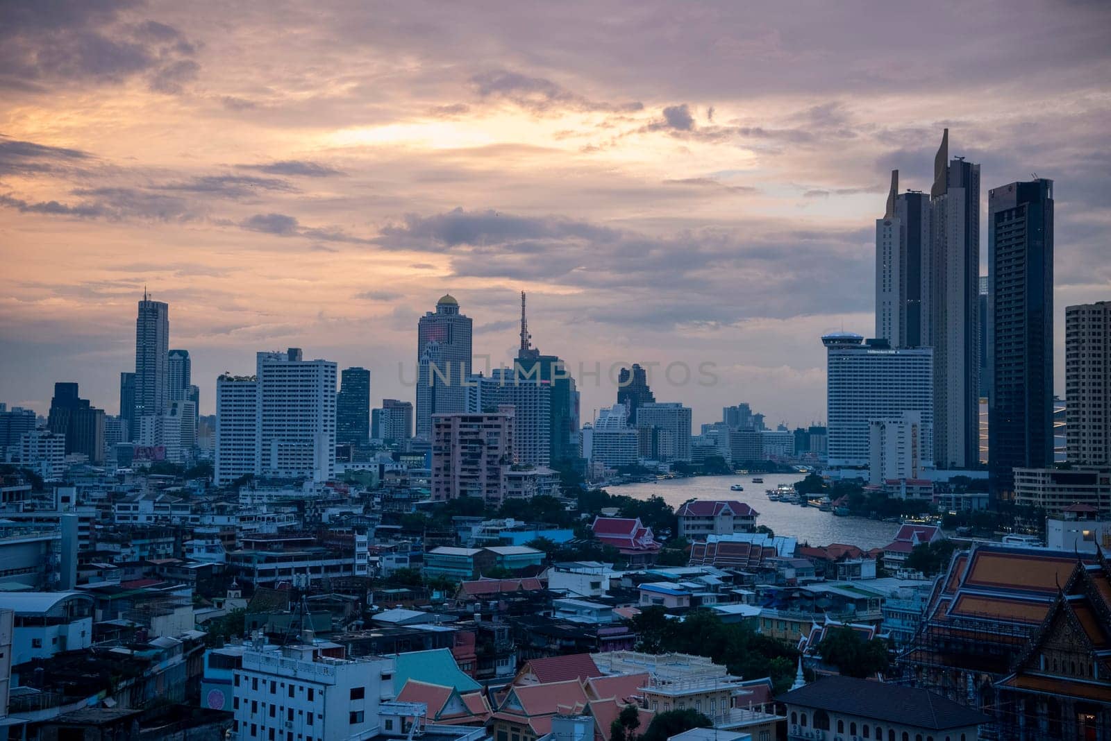 The skyline with Chao Phriya River in the City of Bangkok in Thailand.  Thailand, Bangkok, November, 5, 2024.