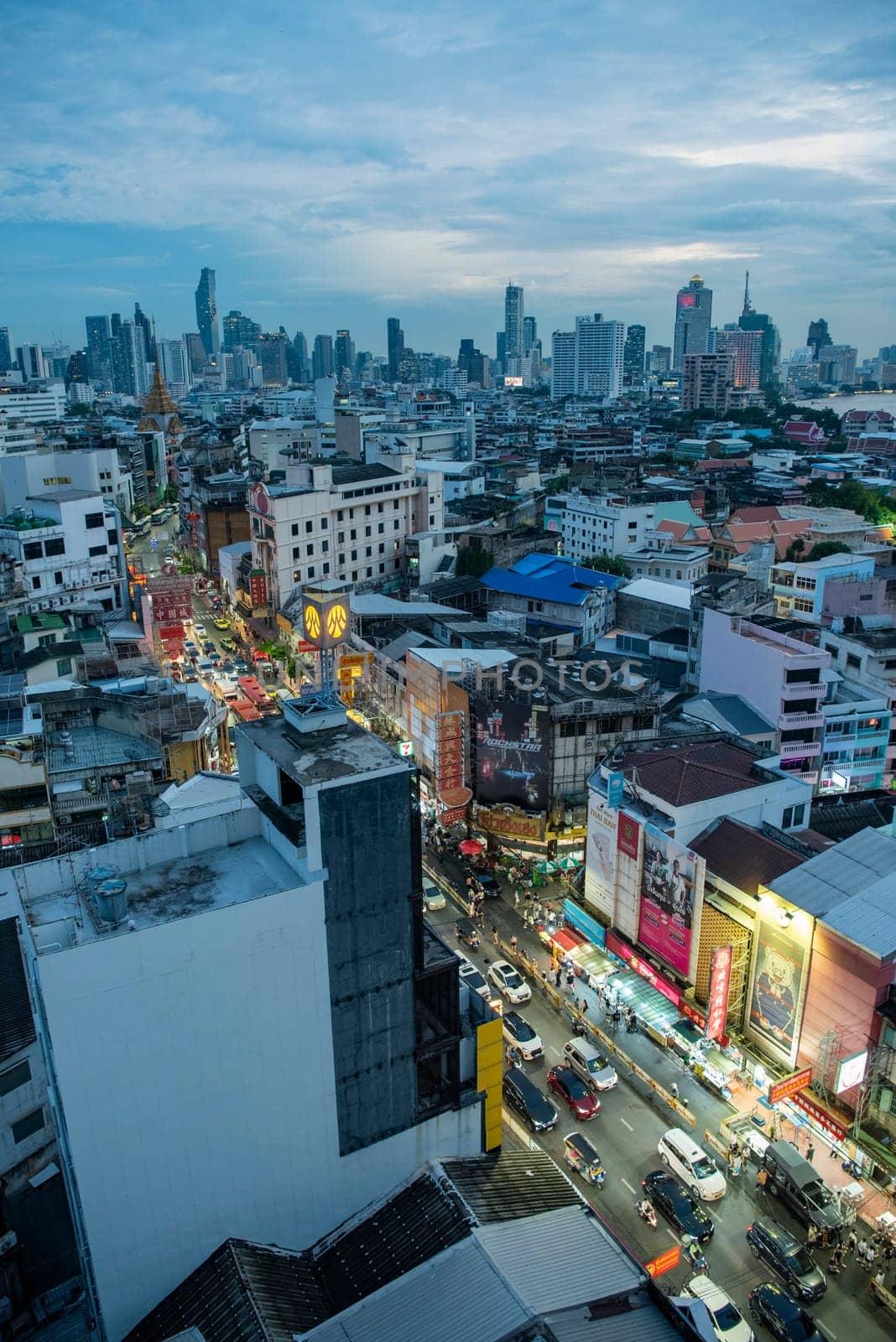 a view on Yaowarat Road in China Town with skyline in City of Bangkok in Thailand.  Thailand, Bangkok, November, 5, 2024.