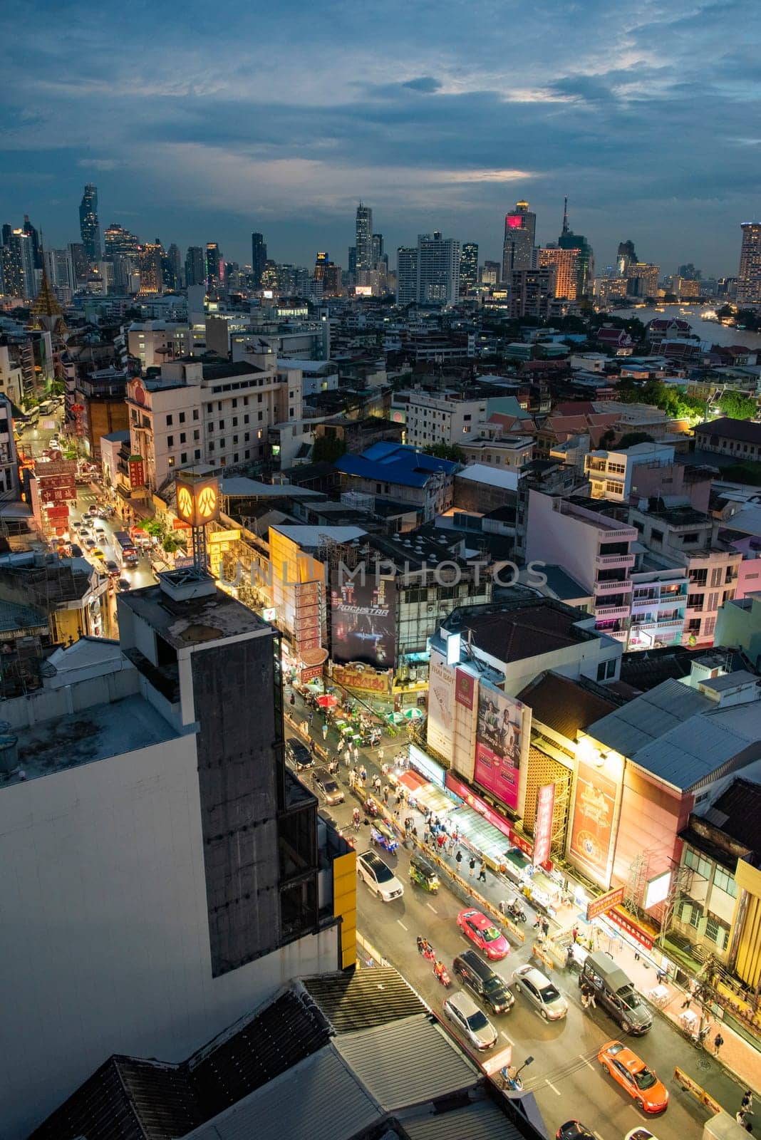 a view on Yaowarat Road in China Town with skyline in City of Bangkok in Thailand.  Thailand, Bangkok, November, 5, 2024.