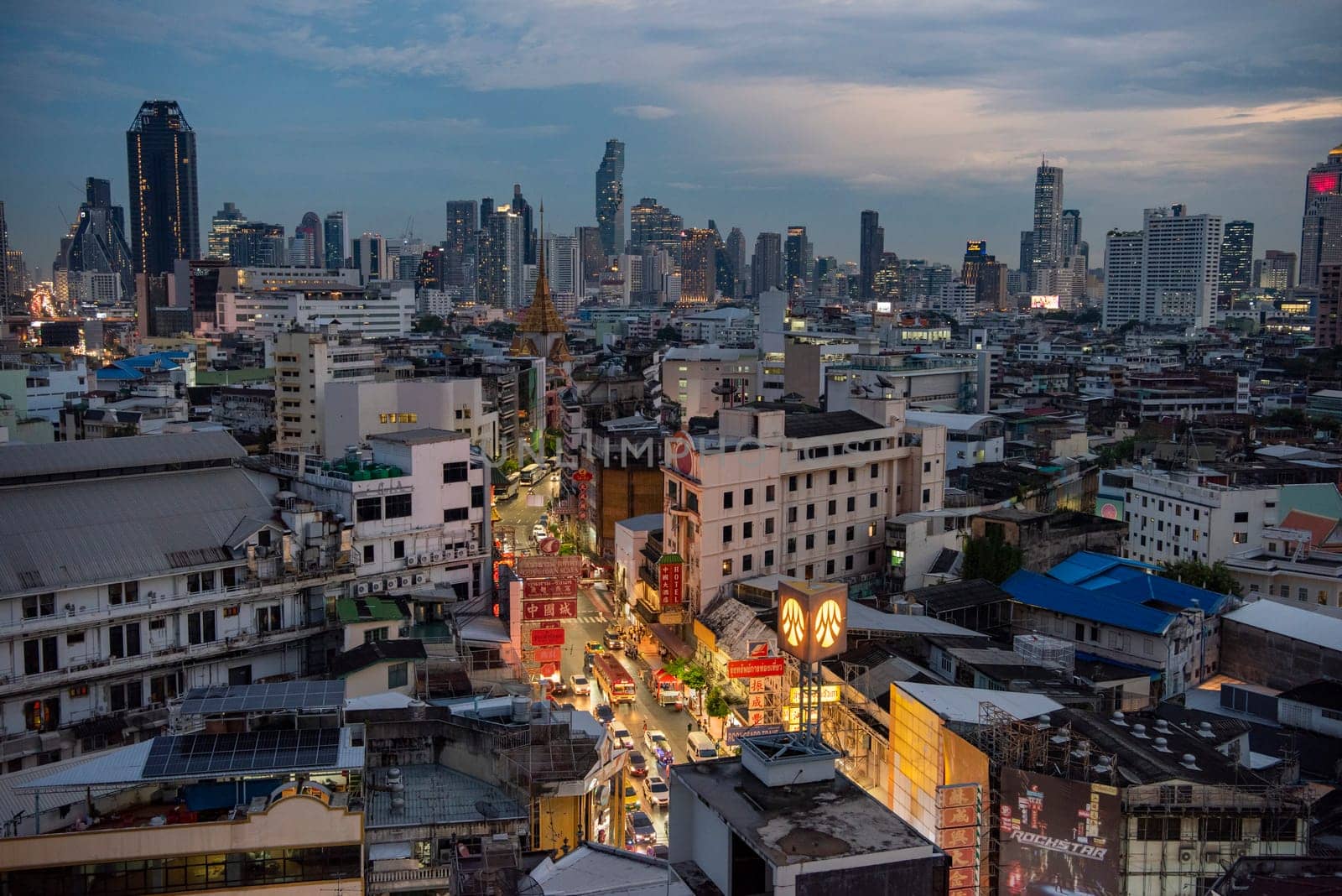 a view on Yaowarat Road in China Town with skyline in City of Bangkok in Thailand.  Thailand, Bangkok, November, 5, 2024.