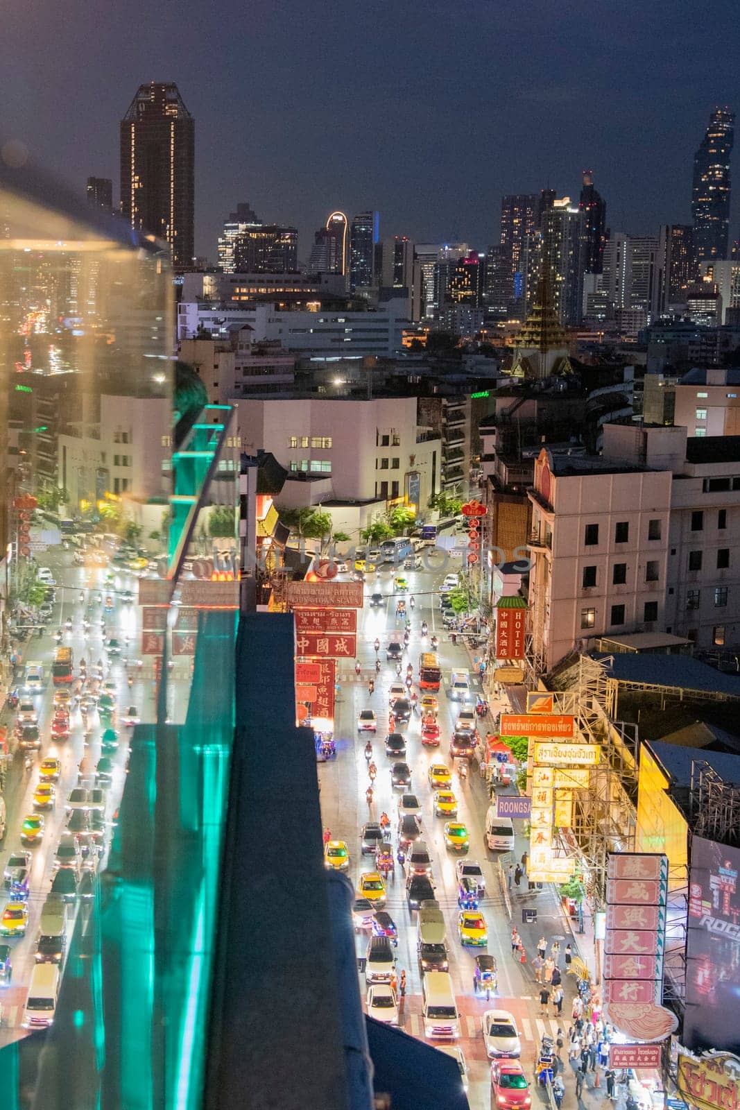 a view on Yaowarat Road in China Town with skyline in City of Bangkok in Thailand.  Thailand, Bangkok, November, 5, 2024.