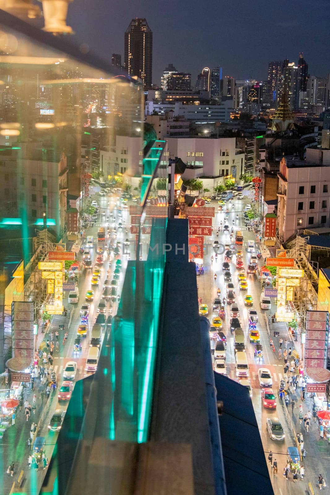 a view on Yaowarat Road in China Town with skyline in City of Bangkok in Thailand.  Thailand, Bangkok, November, 5, 2024.