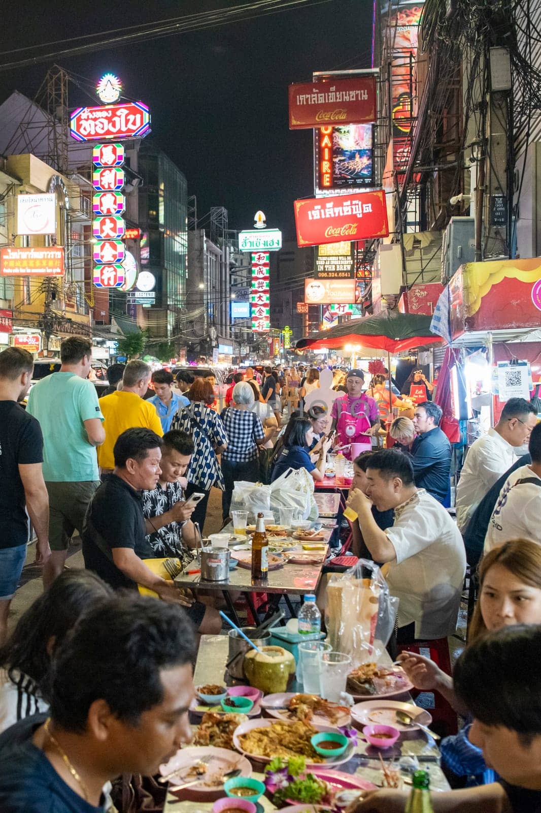 People at Night Streetmarket on Yaowarat Road in Chinatown in City of Bangkok in Thailand.  Thailand, Bangkok, November, 5, 2024.