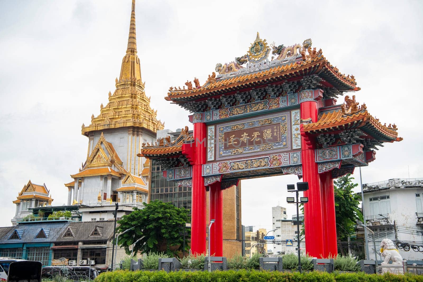 The Chinese Gate at Wat Traimit in Chinatown in the City of Bangkok in Thailand.  Thailand, Bangkok, November, 6, 2024.