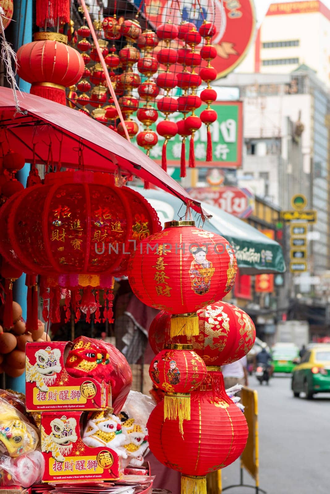 a Market street with shops in the China Town with skyline in the City of Bangkok in Thailand.  Thailand, Bangkok, November, 6, 2024.