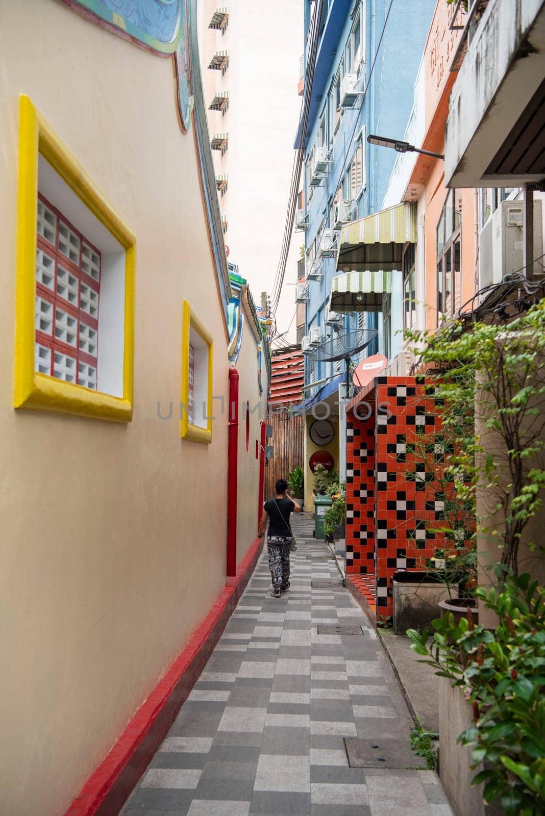  a small alley in Talat Noi at China Town in City of Bangkok in Thailand.  Thailand, Bangkok, November, 6, 2024.