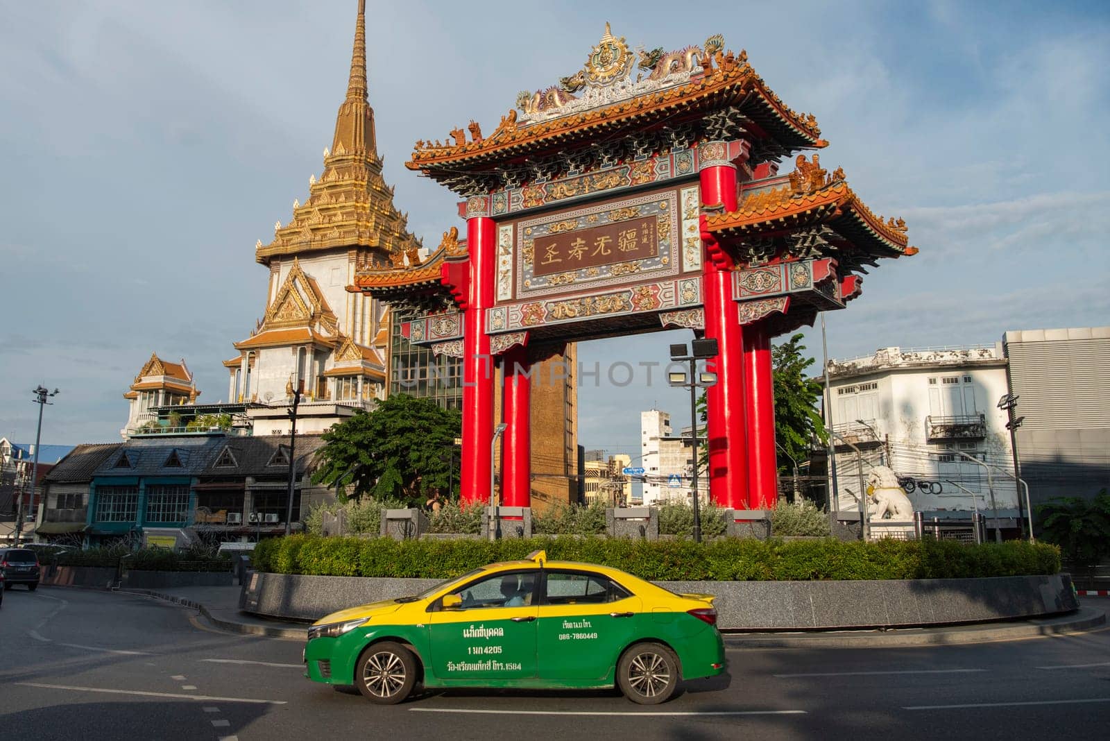 The Chinese Gate at Wat Traimit in Chinatown in the City of Bangkok in Thailand.  Thailand, Bangkok, November, 6, 2024.