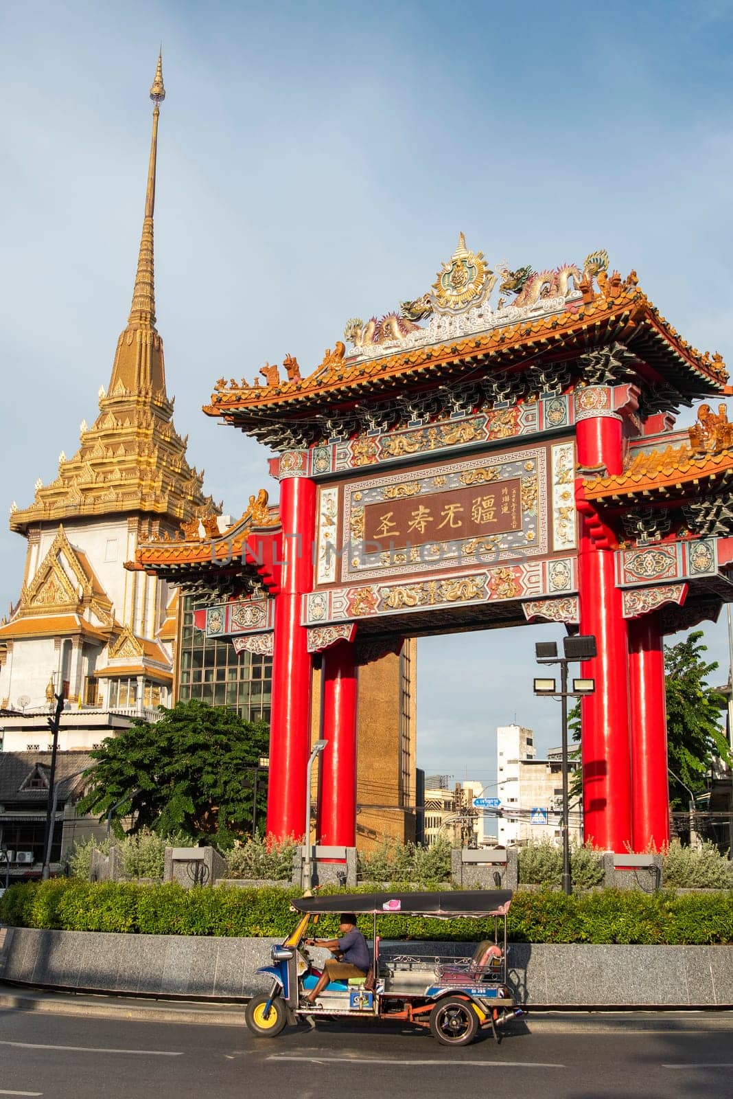 The Chinese Gate at Wat Traimit in Chinatown in the City of Bangkok in Thailand.  Thailand, Bangkok, November, 6, 2024.