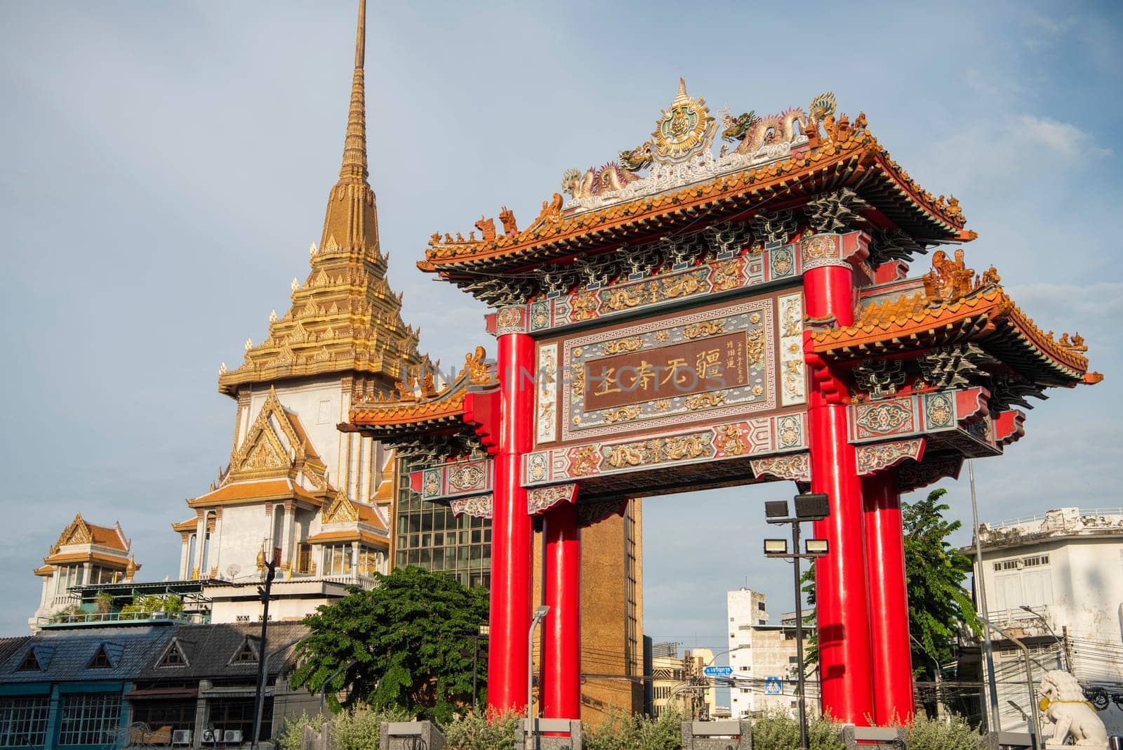 The Chinese Gate at Wat Traimit in Chinatown in the City of Bangkok in Thailand.  Thailand, Bangkok, November, 6, 2024.