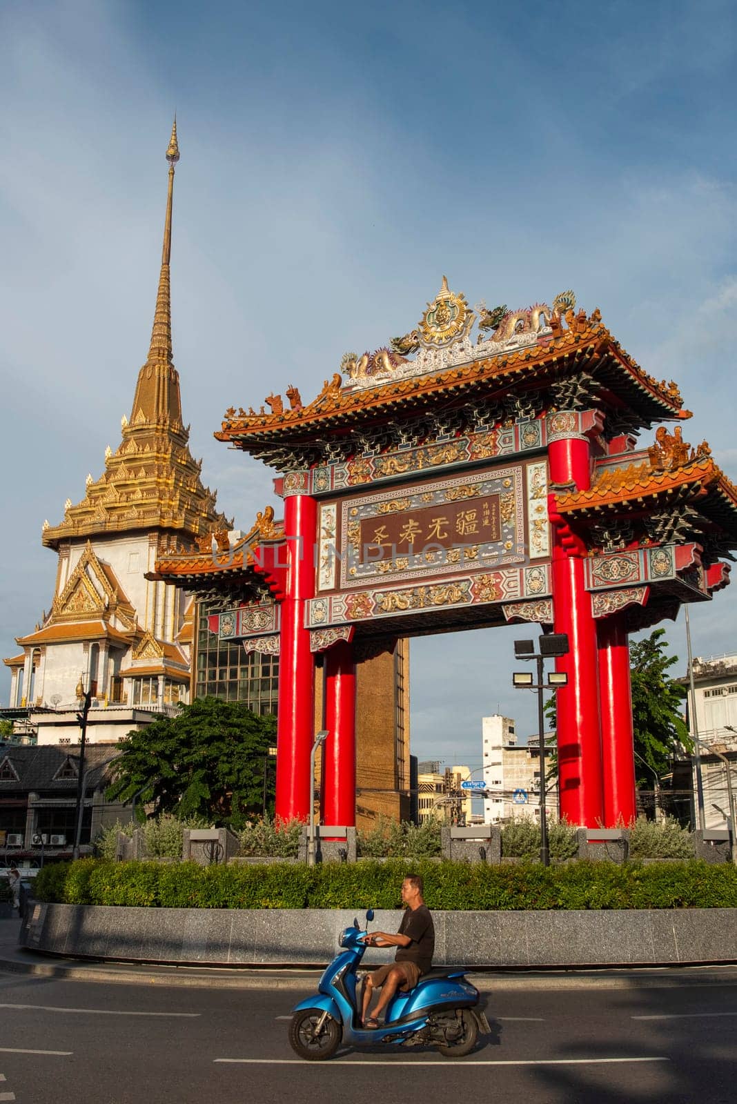 The Chinese Gate at Wat Traimit in Chinatown in the City of Bangkok in Thailand.  Thailand, Bangkok, November, 6, 2024.