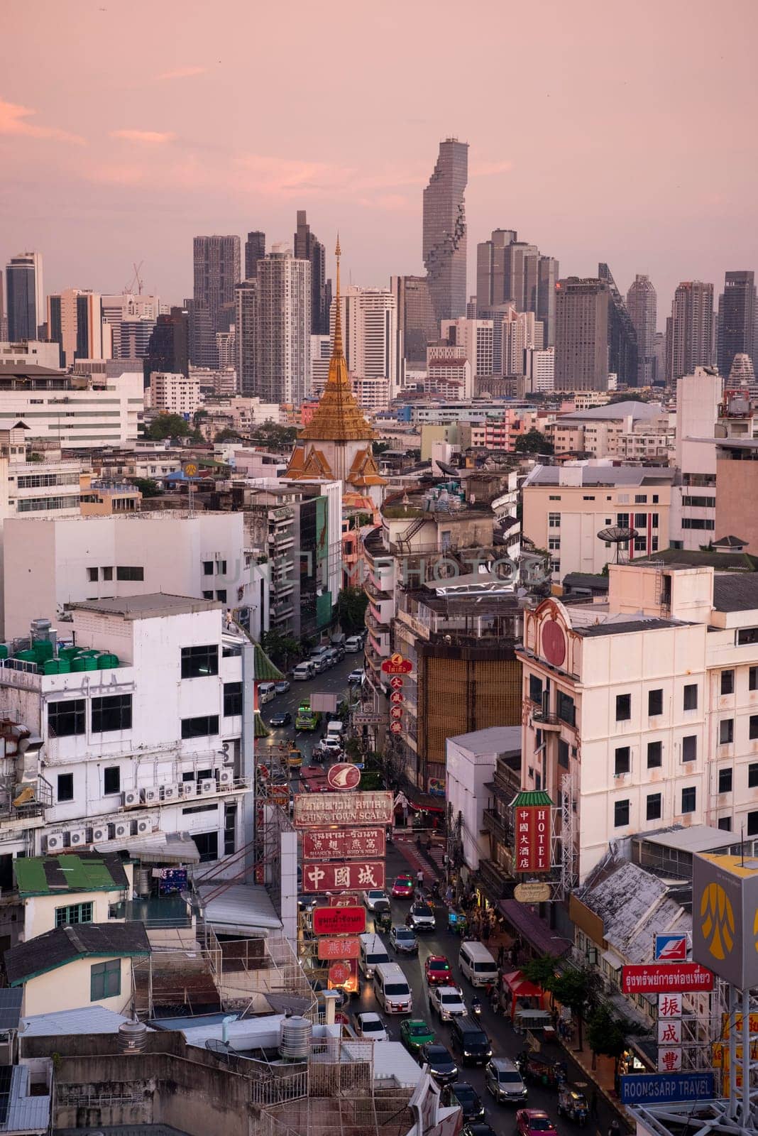 a view on Yaowarat Road in China Town with skyline in City of Bangkok in Thailand.  Thailand, Bangkok, November, 6, 2024.