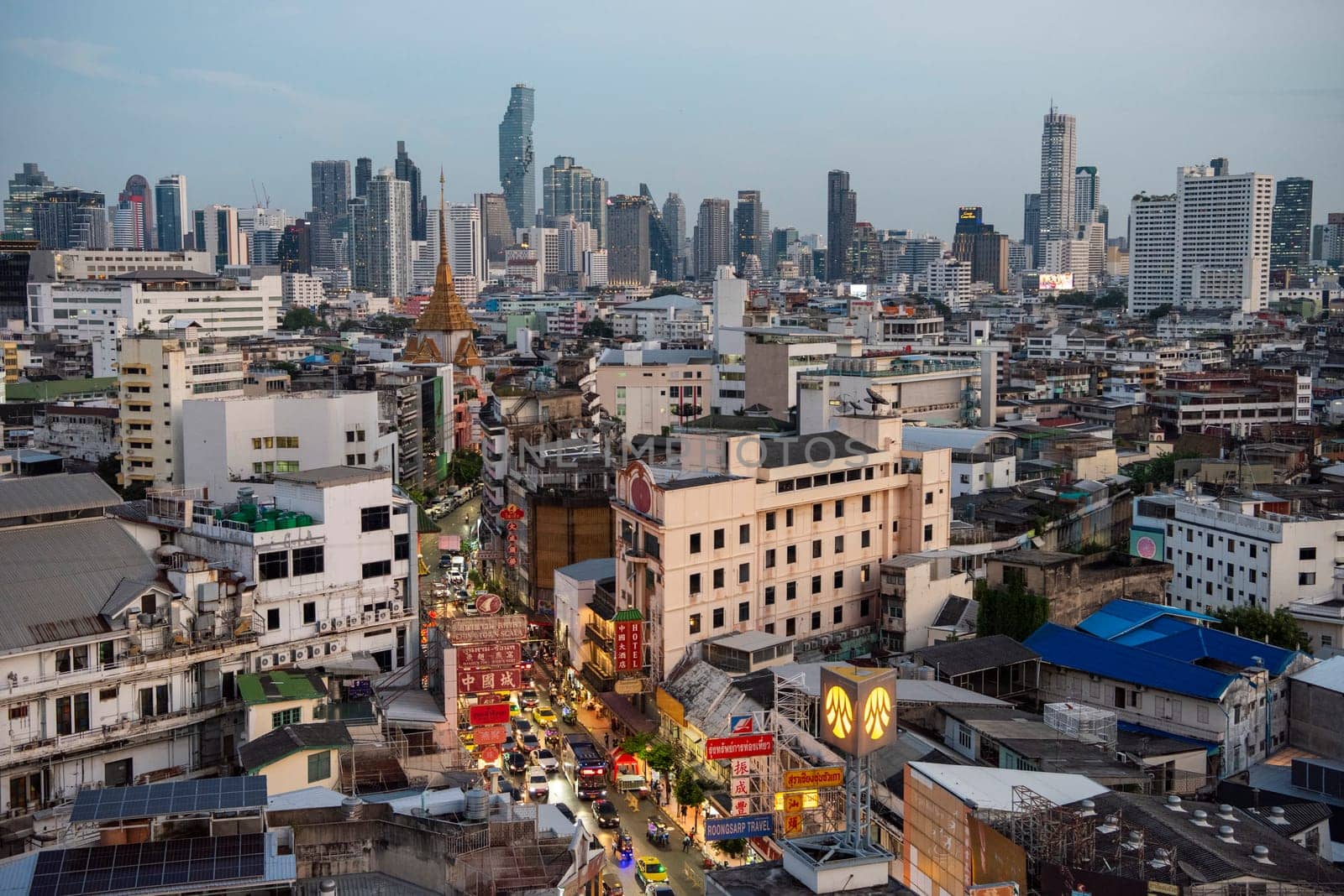 a view on Yaowarat Road in China Town with skyline in City of Bangkok in Thailand.  Thailand, Bangkok, November, 6, 2024.