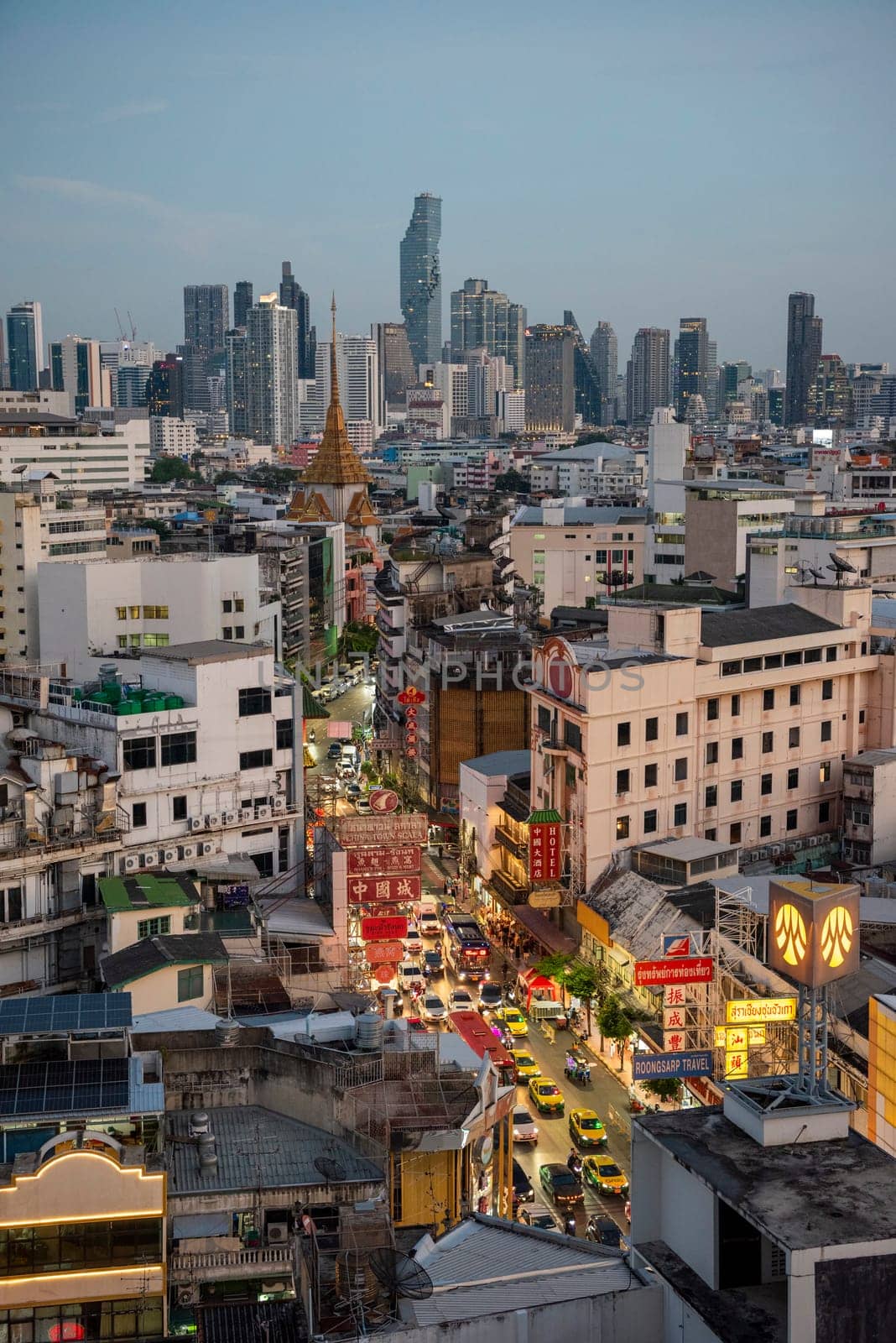 a view on Yaowarat Road in China Town with skyline in City of Bangkok in Thailand.  Thailand, Bangkok, November, 6, 2024.