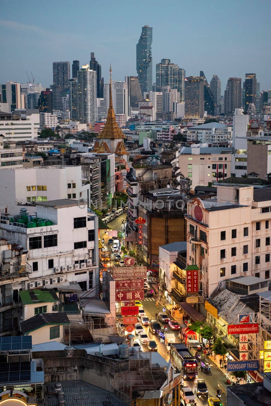 a view on Yaowarat Road in China Town with skyline in City of Bangkok in Thailand.  Thailand, Bangkok, November, 6, 2024.
