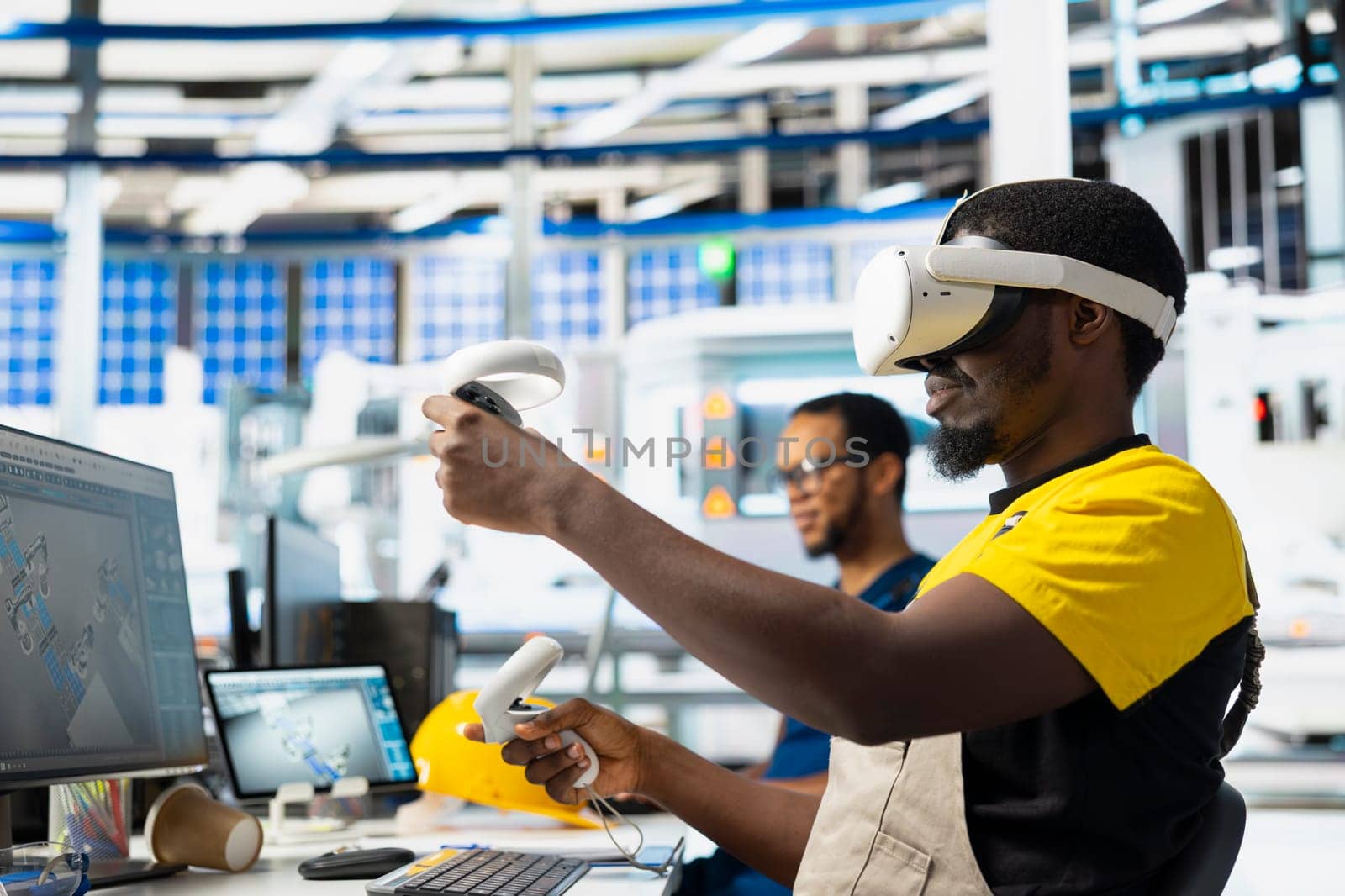 African american engineer in photovoltaics plant uses virtual reality goggles to diagnose malfunctioning systems. Male solar panels factory specialist using VR headset for inspection.