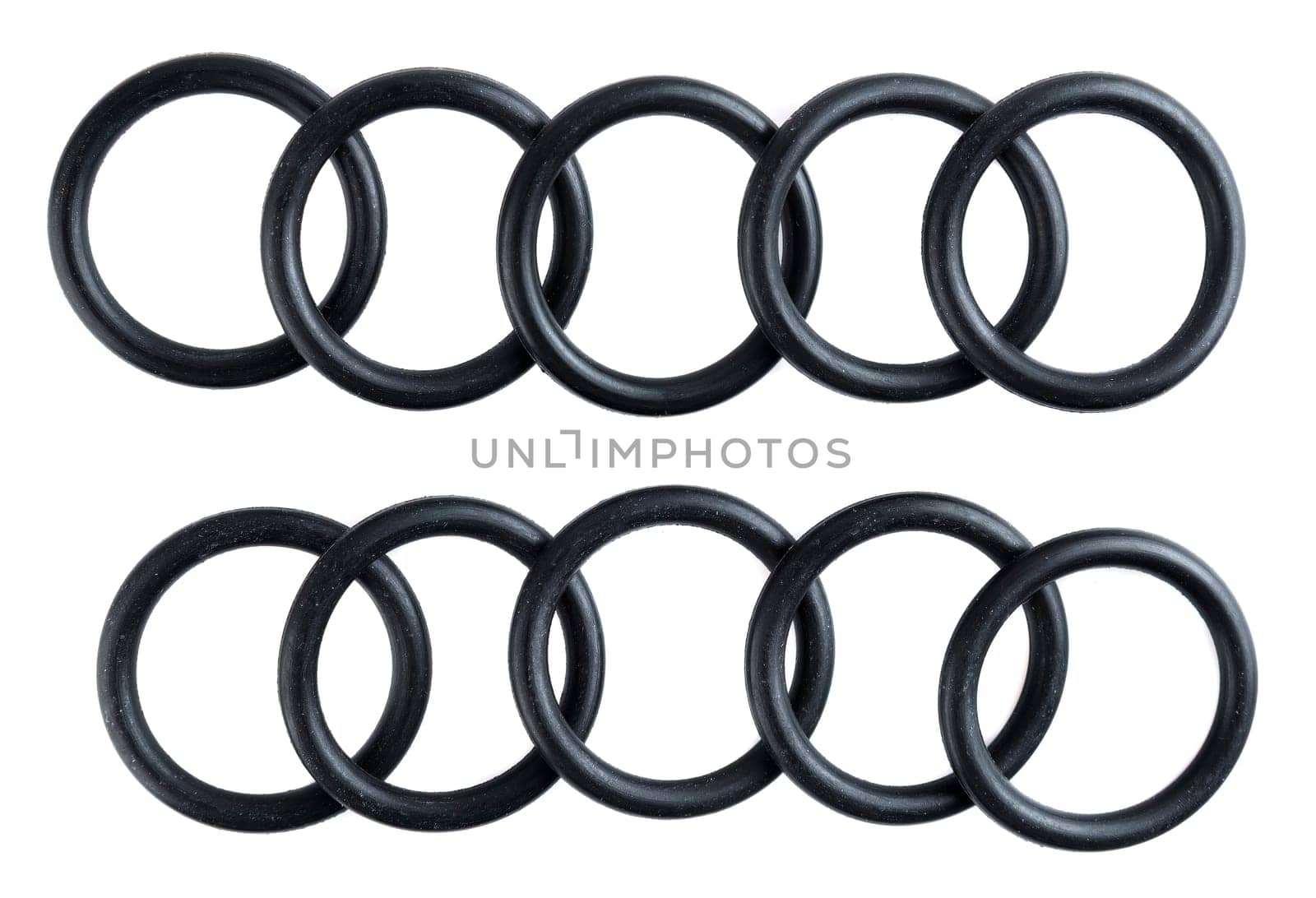 Set of 10 black rubber washers isolated on white background. Automotive spare parts for repair or replacement. Ideal for catalog or online store display.