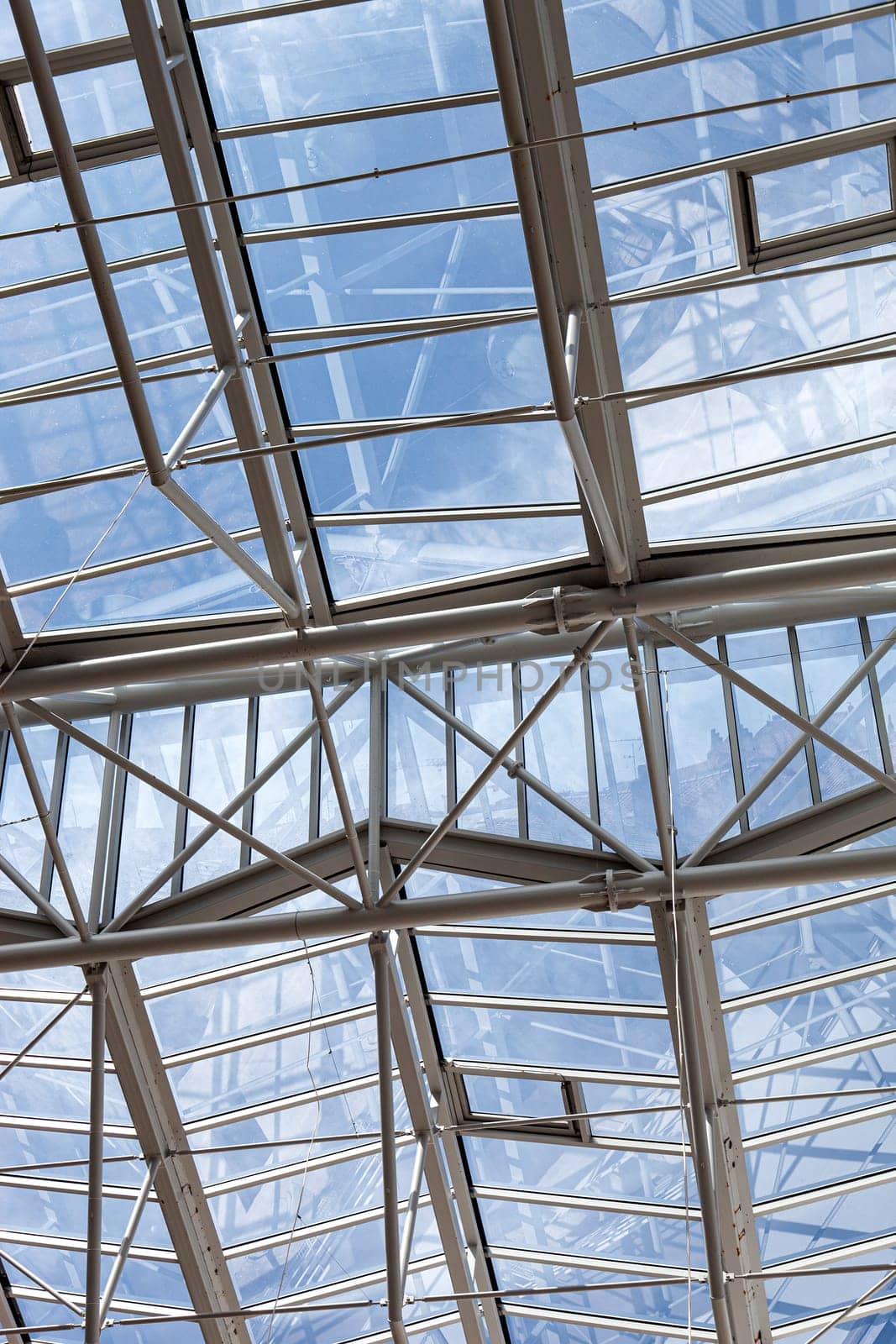 Metal beams in a large glass roof