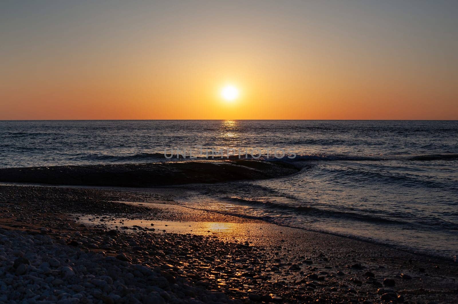 Sunset at dusk on an Atlantic beach