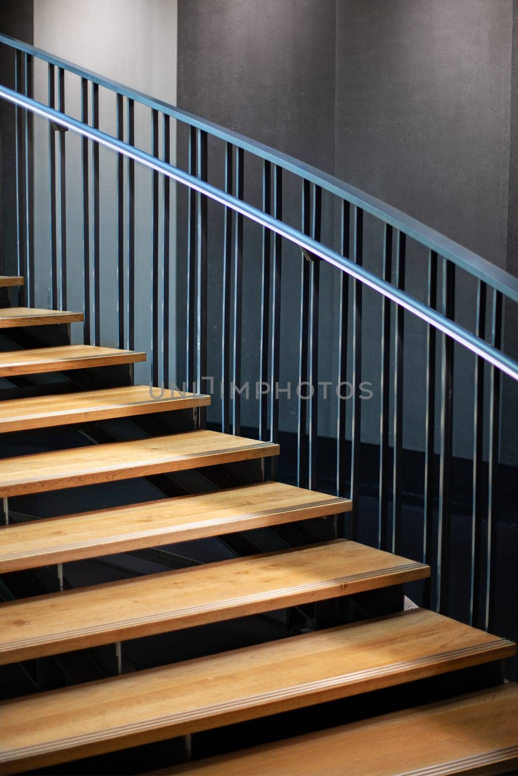 Wooden staircase and metal railing