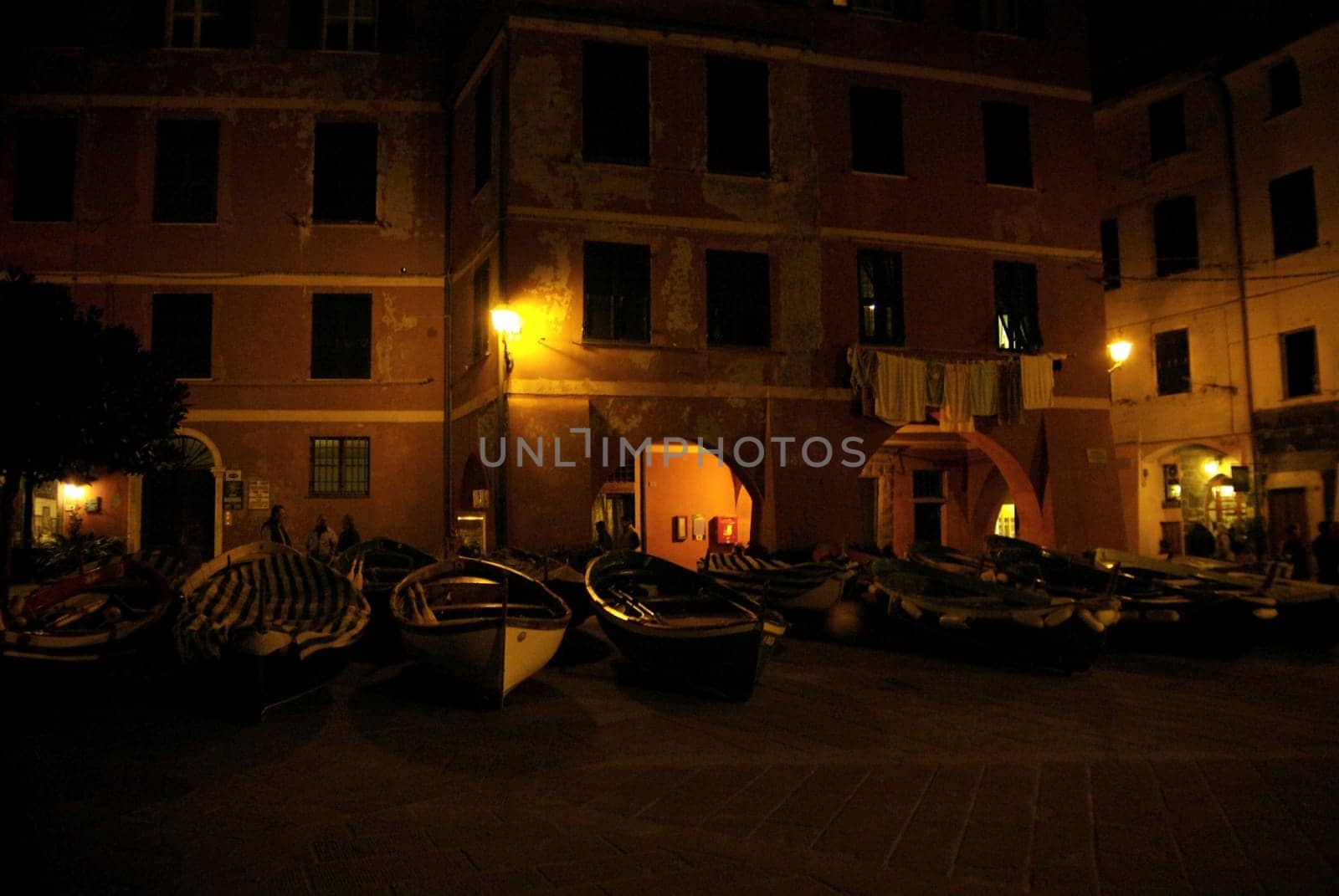 Vernazza, Italy - November 11, 2007: Buildings in Vernazza town. Is one of five famous colorful village of Cinque Terre National Park in Italy. In the night.