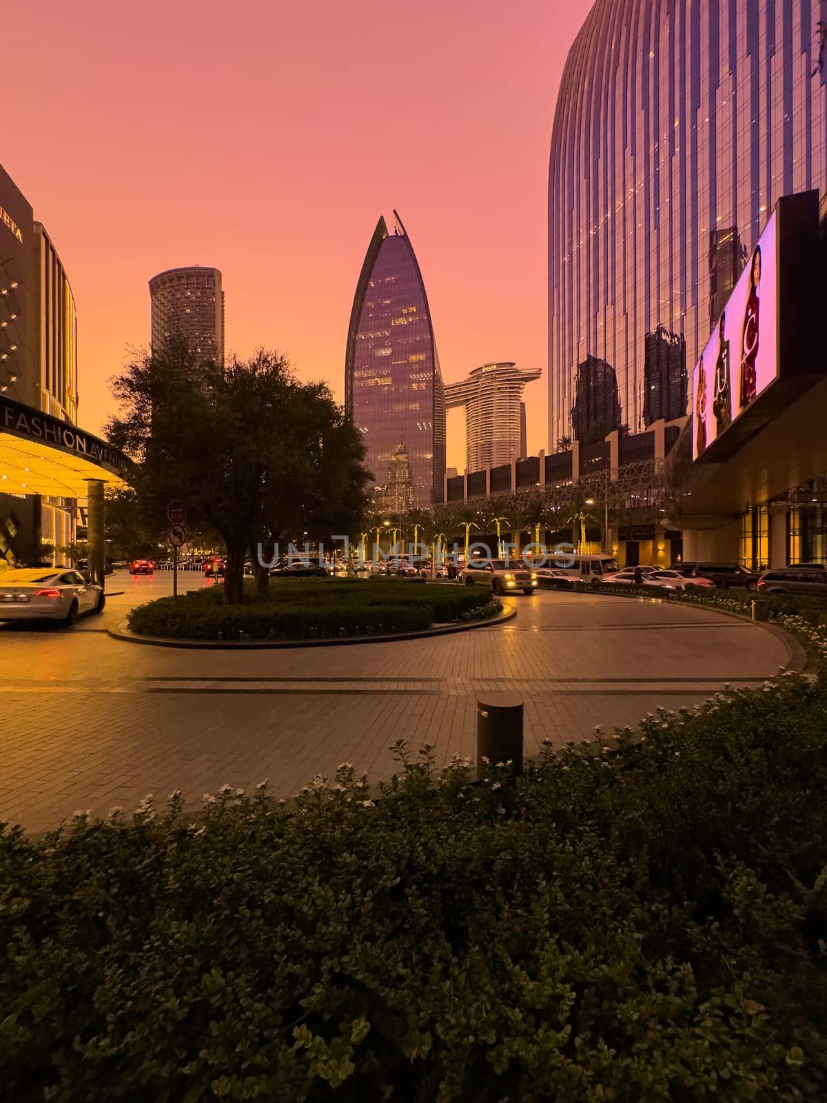 UAE, Dubai, 19 September 2024: architecture of the city at sunset, skyscrapers with glass facades. High quality photo