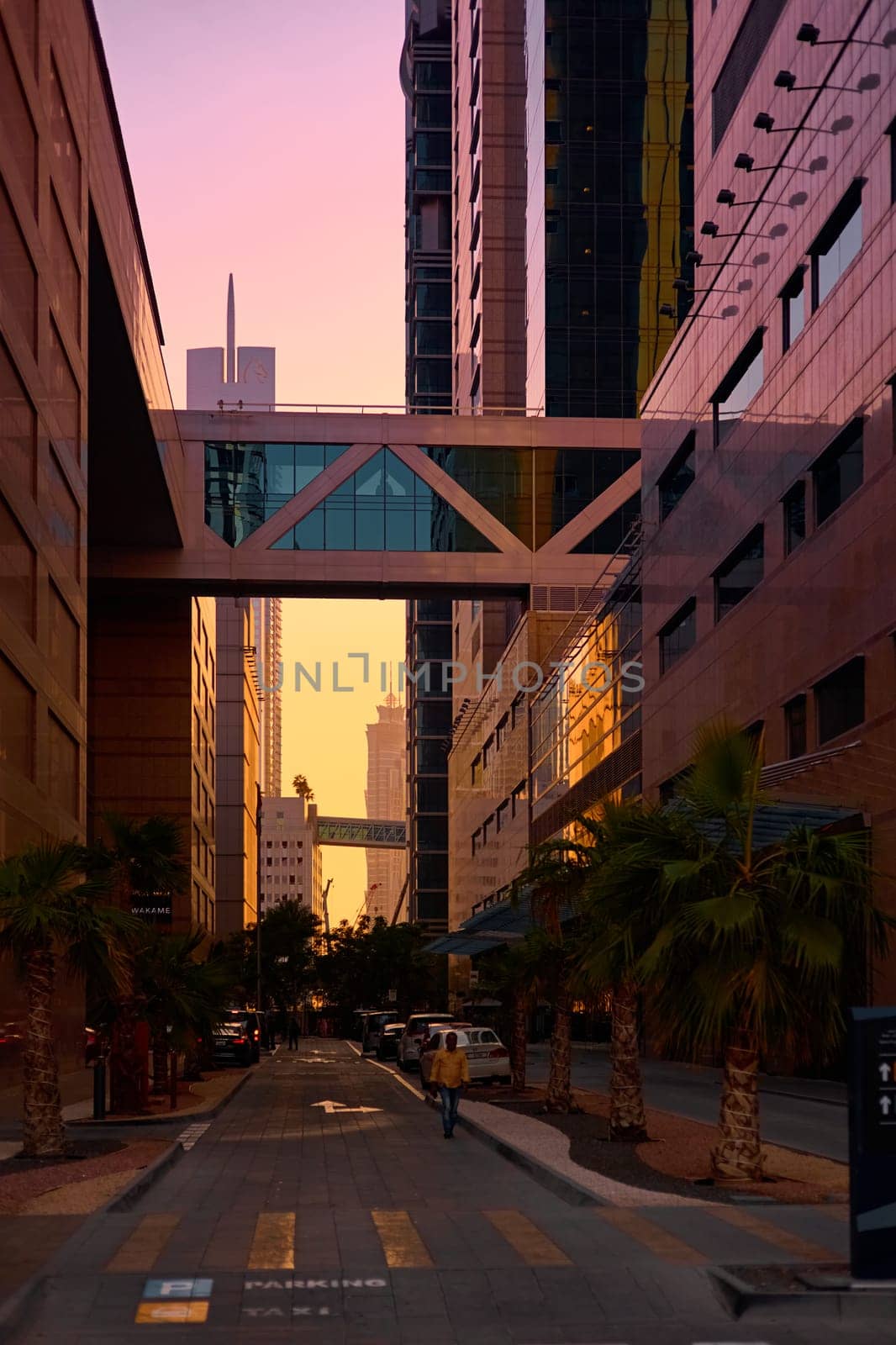 UAE, Dubai, 19 September 2024: architecture of the city at sunset, skyscrapers with glass facades. High quality photo