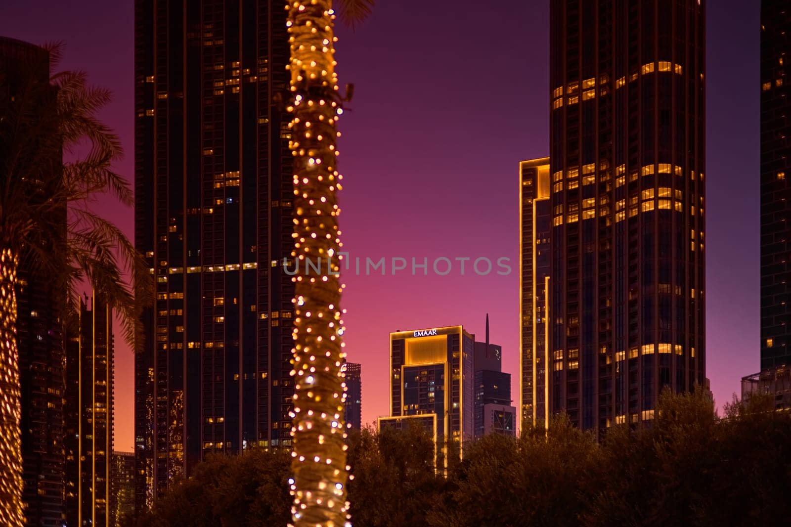UAE, Dubai, 19 September 2024: architecture of the city at sunset, skyscrapers with glass facades. High quality photo