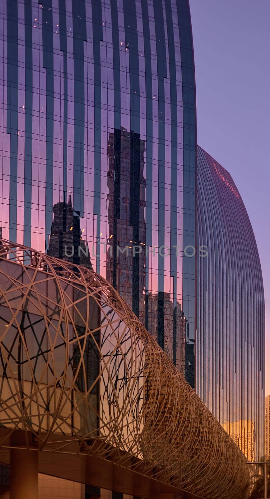 UAE, Dubai, 19 September 2024: architecture of the city at sunset, skyscrapers with glass facades. High quality photo