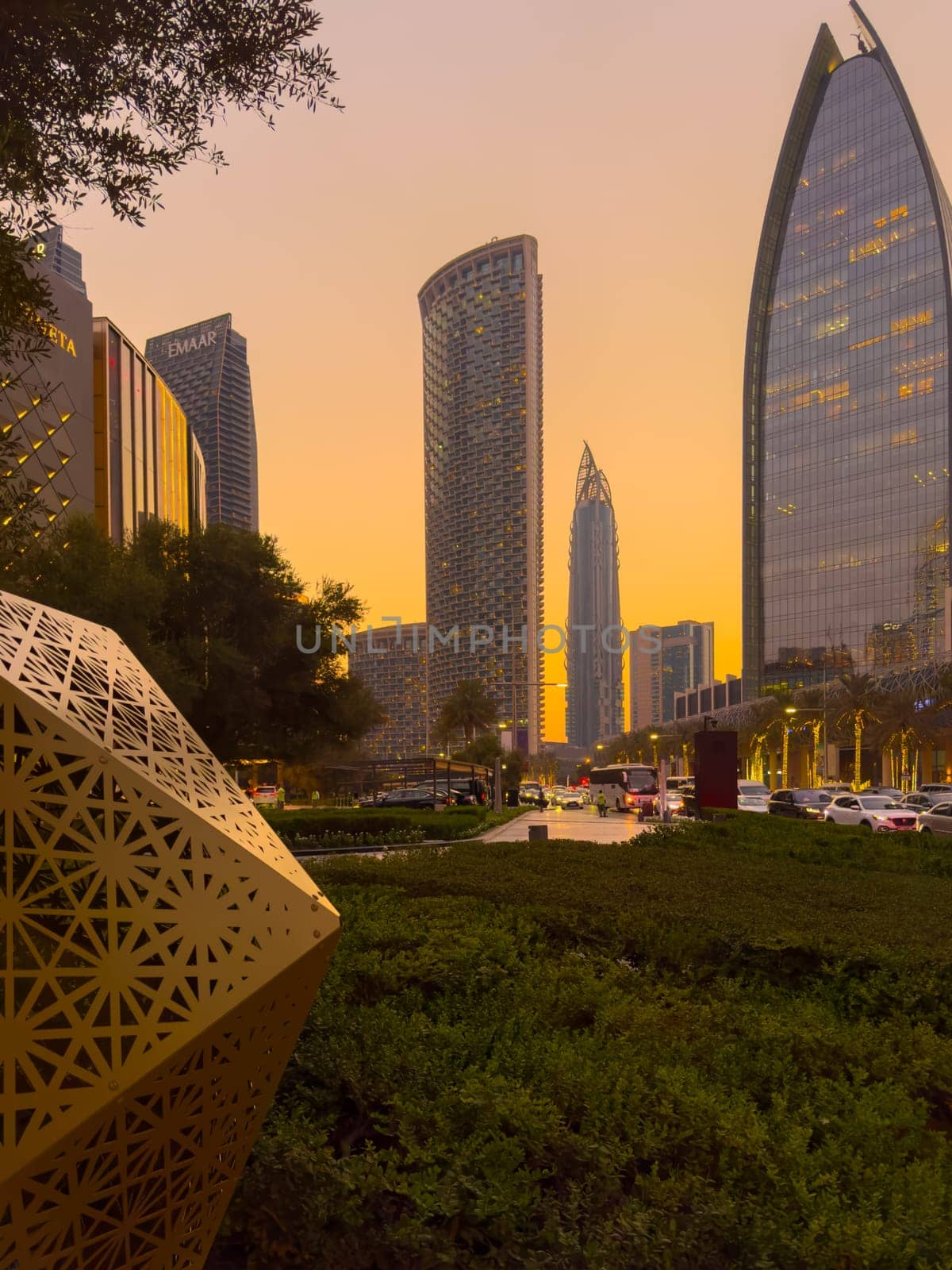 UAE, Dubai, 19 September 2024: architecture of the city at sunset, skyscrapers with glass facades. High quality photo